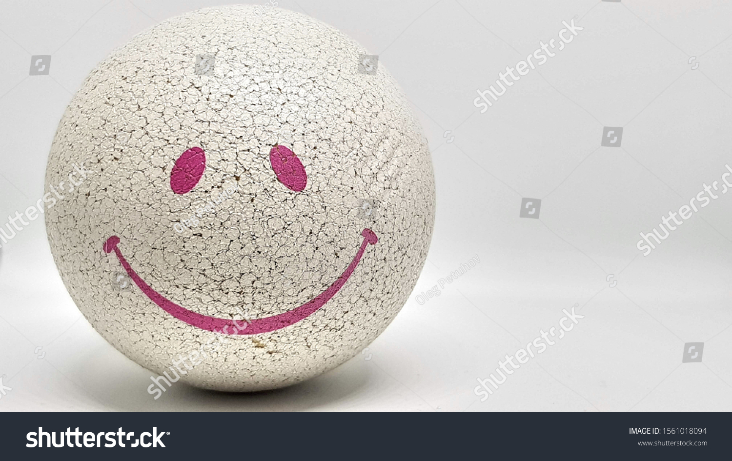 ball with a smile face #1561018094