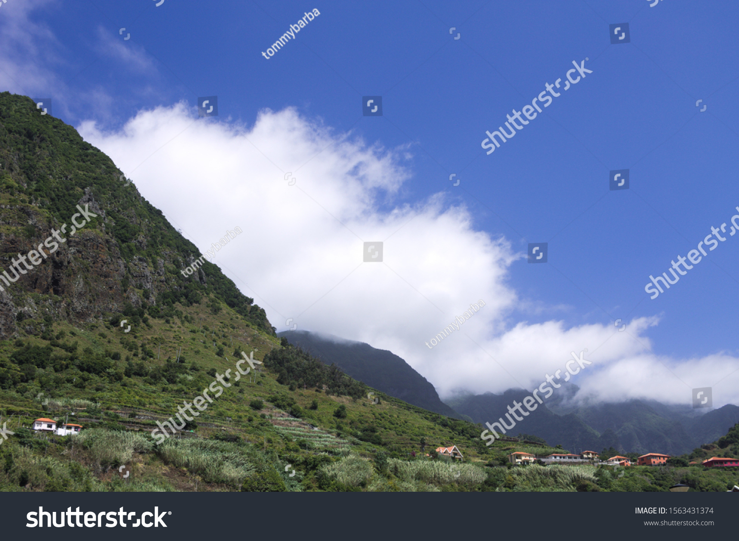 Panoramic view of the mountains surrounded by clouds in the coutryside of Sao Vicente (Madeira, Portugal, Europe) #1563431374