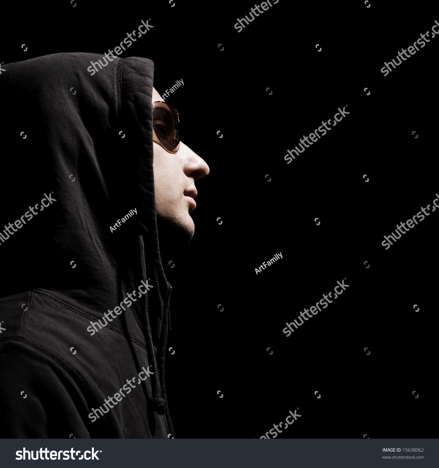 profile of handsome man in hood and sunglasses #15638062
