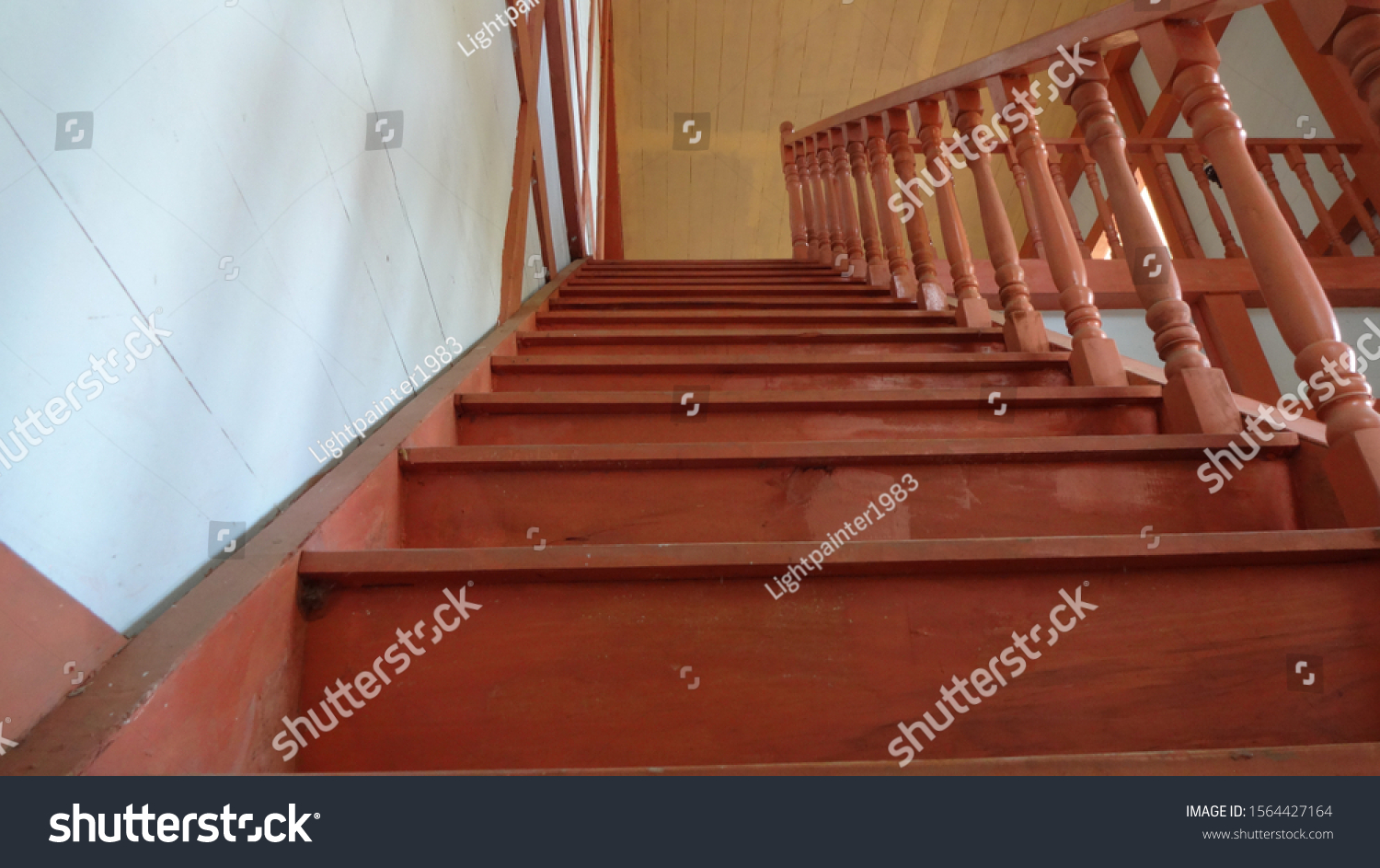 wooden stairs to the second floor #1564427164