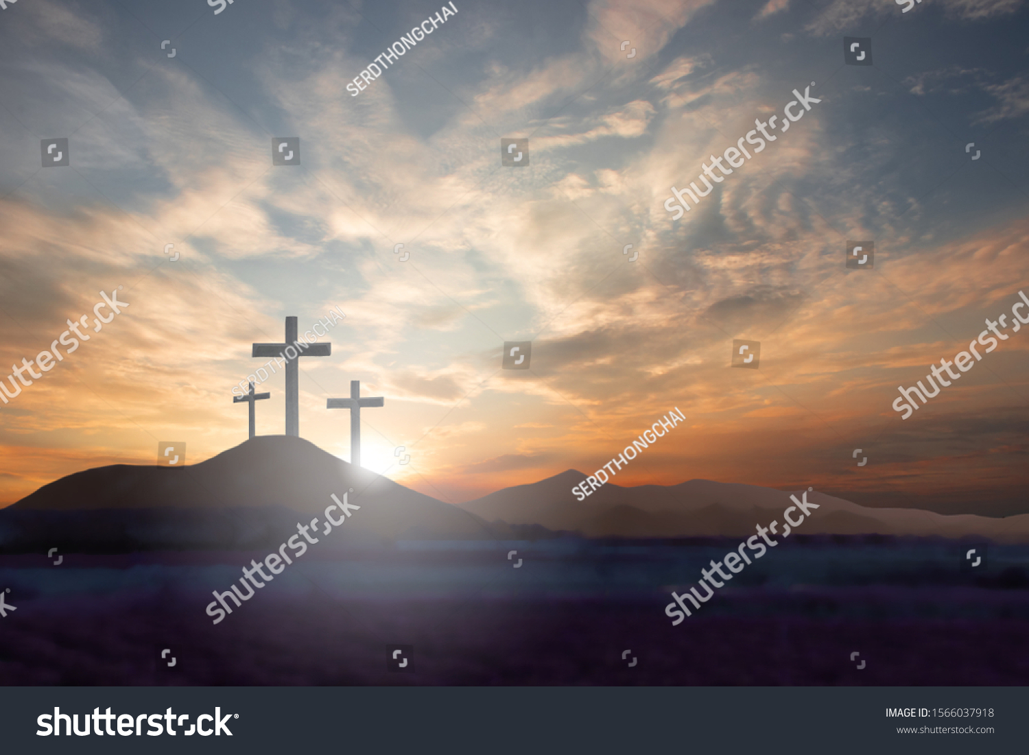 Three crosses on the mountain Jesus Christ with a sunset background #1566037918