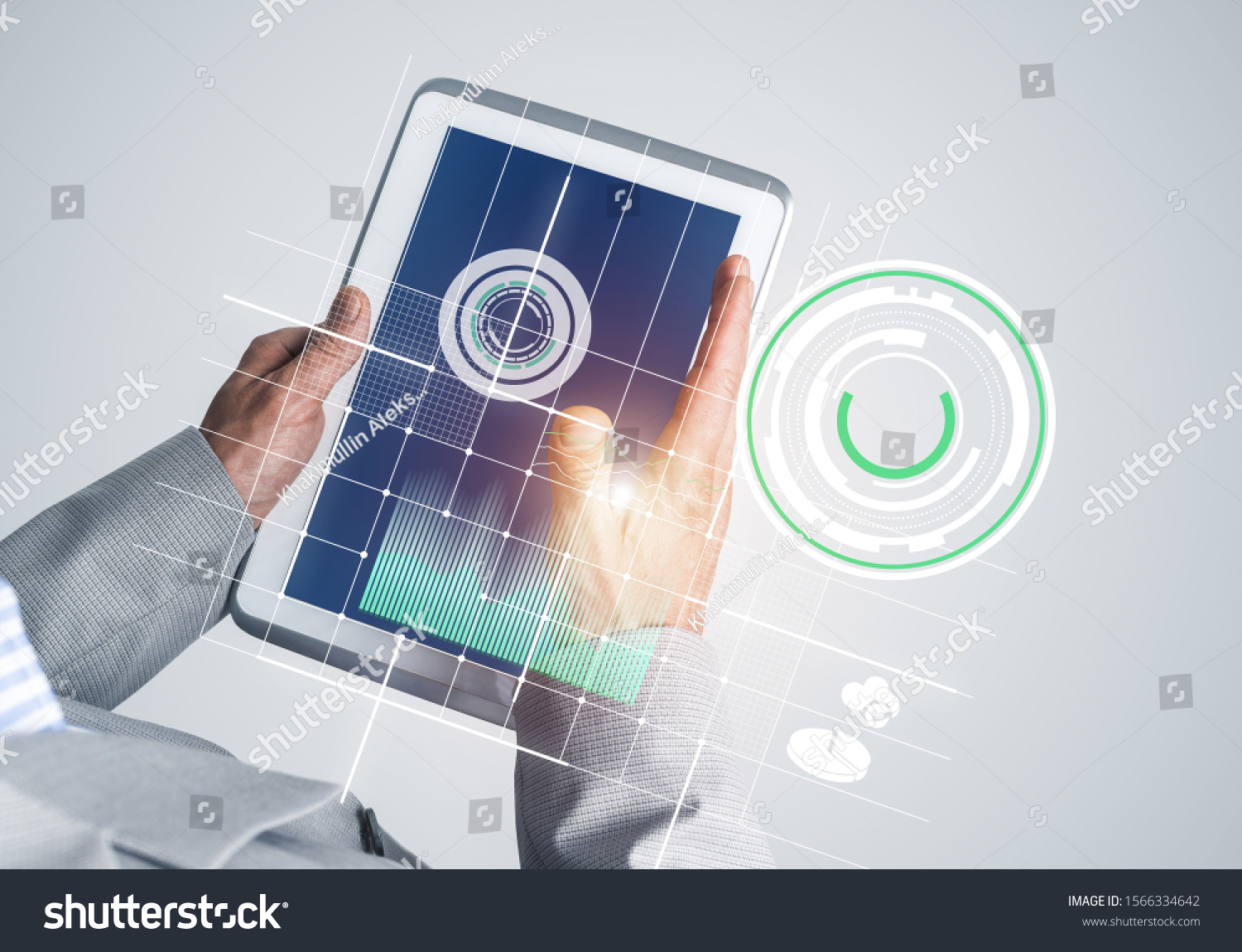 Close of businessman hands holding tablet pc with infographs on screen #1566334642