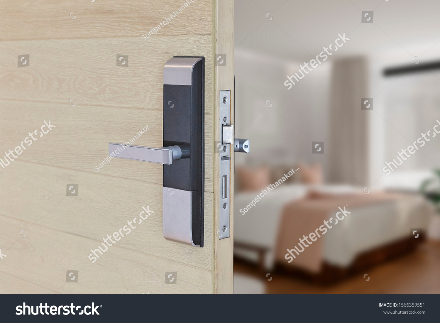 Digital door locking on wood door. Close up and selective focus. #1566359551