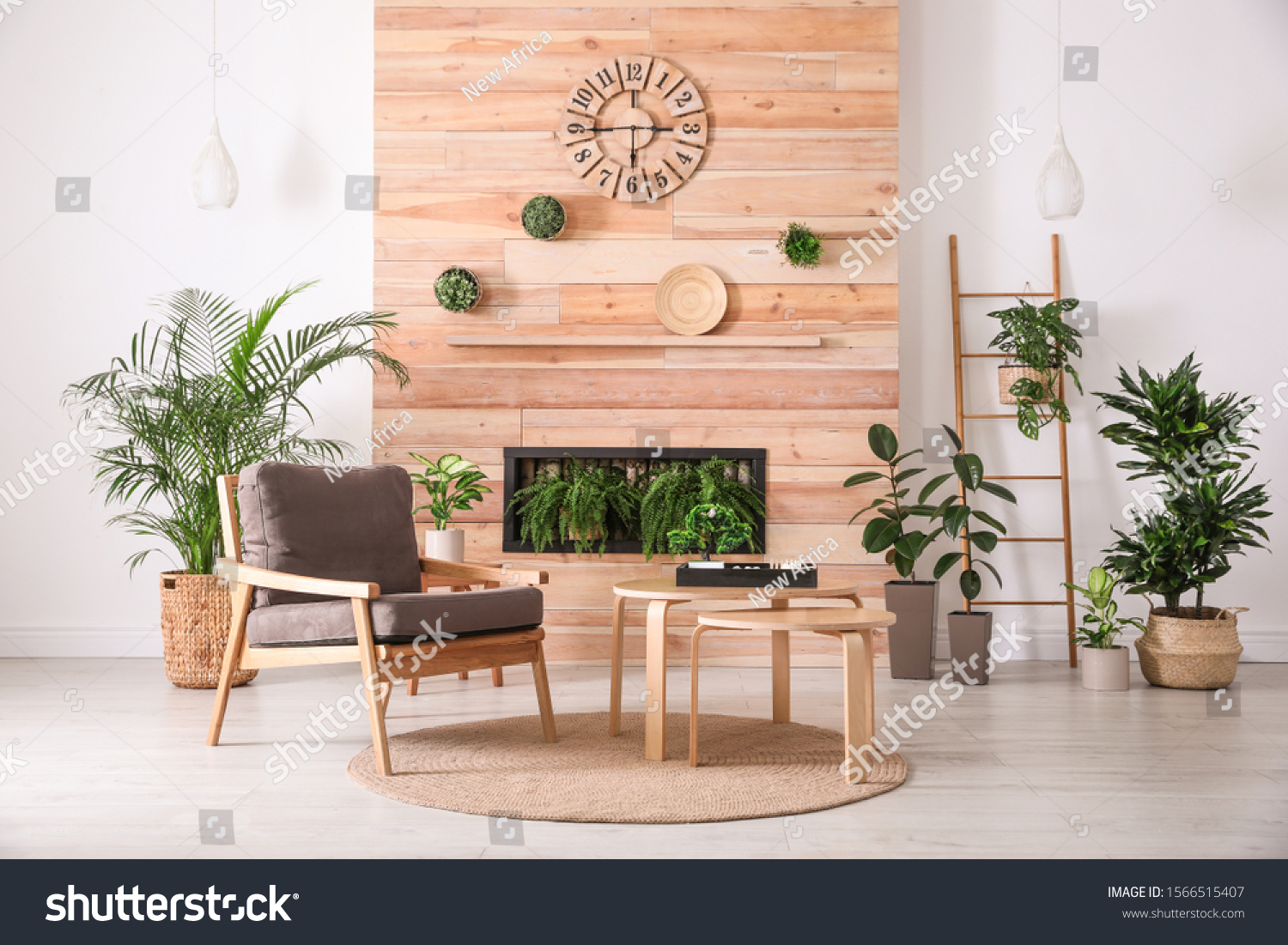 Stylish living room interior with armchair, green plants and miniature zen garden. Home design ideas #1566515407