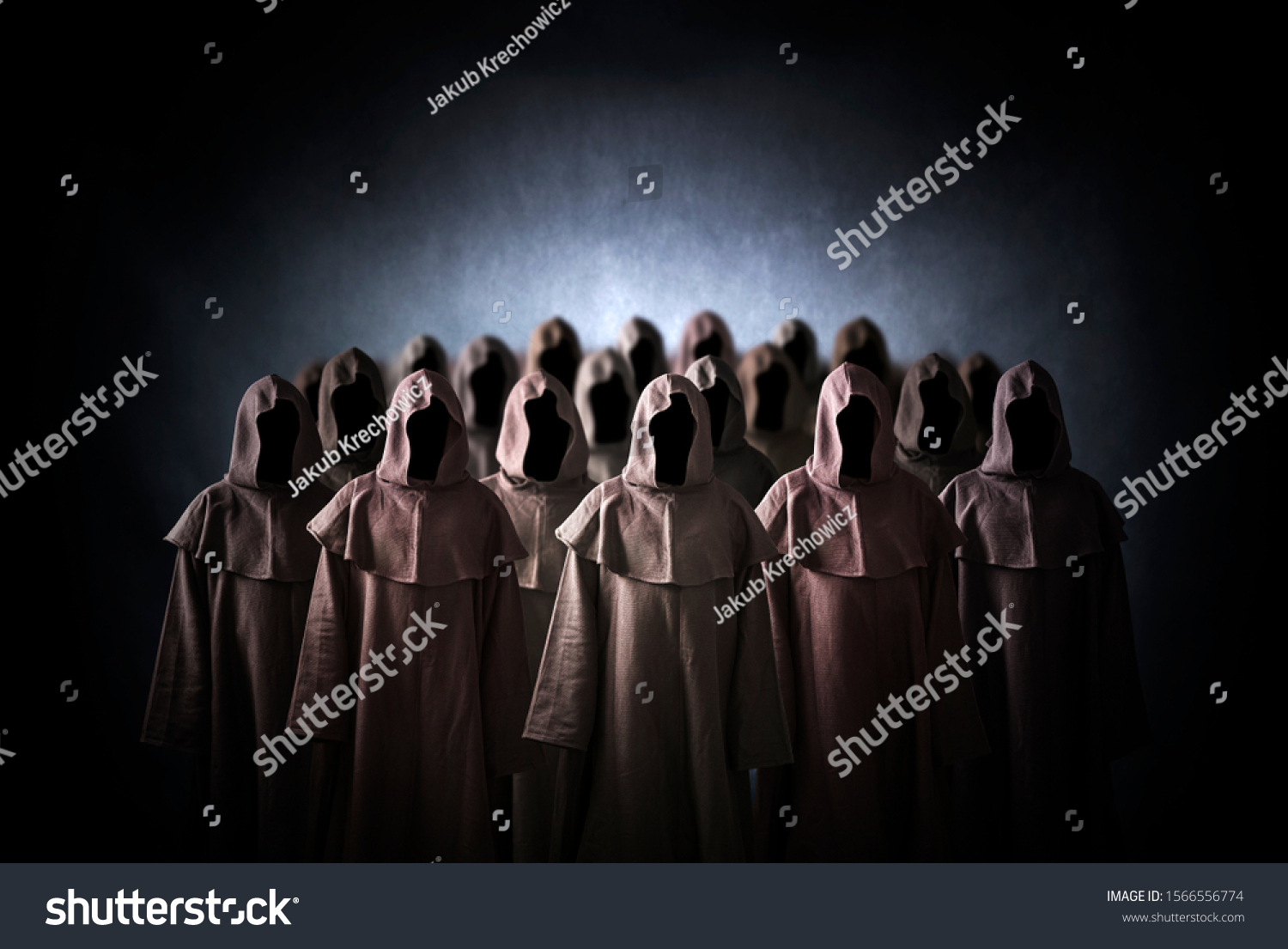 Group of scary figures in hooded cloaks #1566556774
