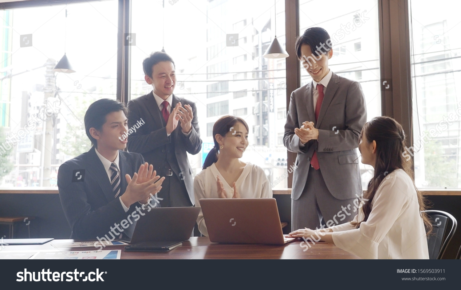 asian businesspeople working in office #1569503911
