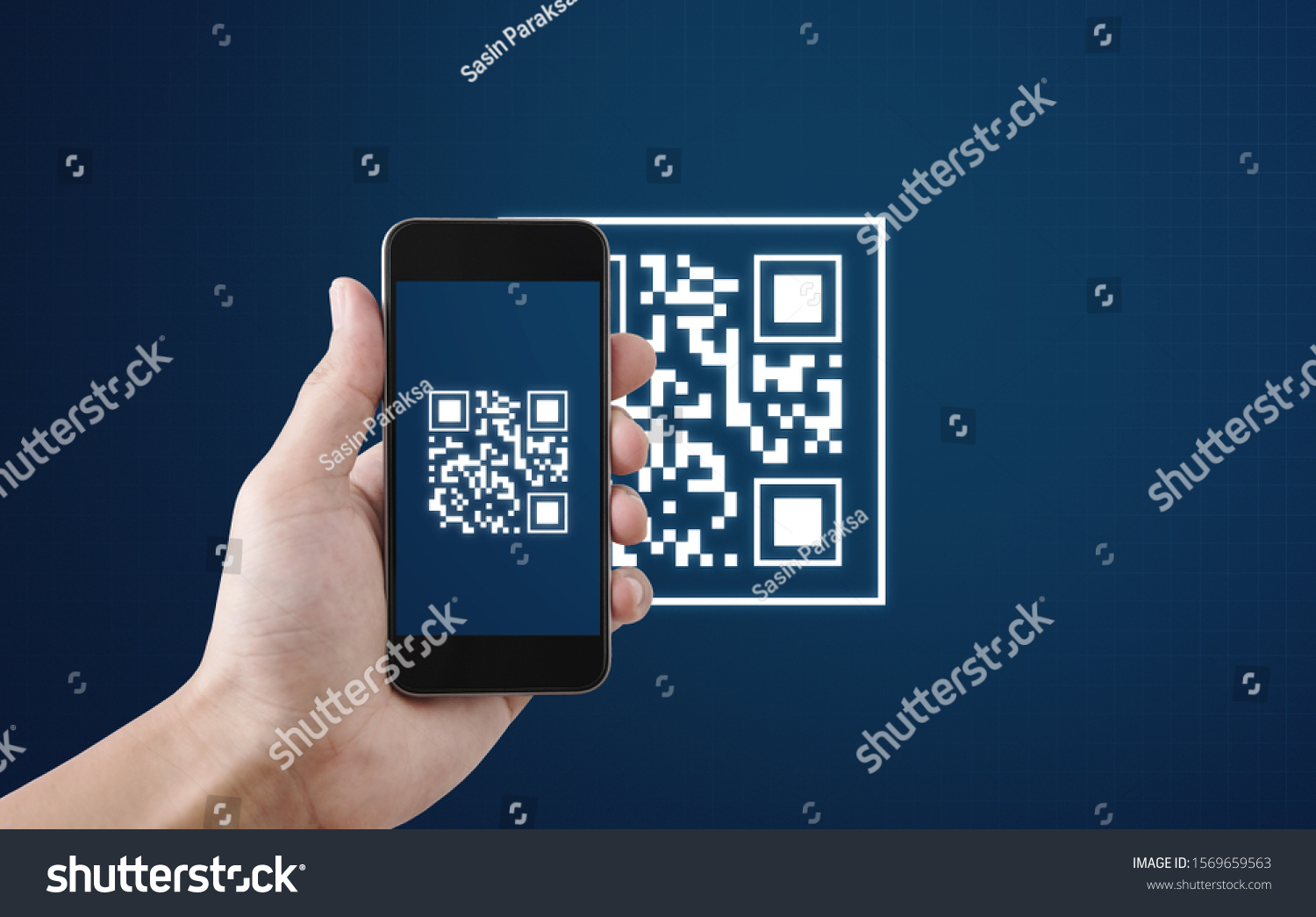 QR code scanning payment and verification. Hand using mobile smart phone scan QR code #1569659563