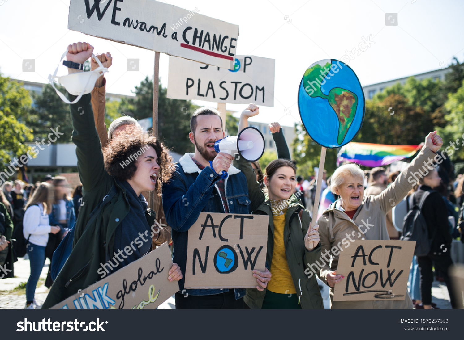 People with placards and amplifier on global strike for climate change. #1570237663