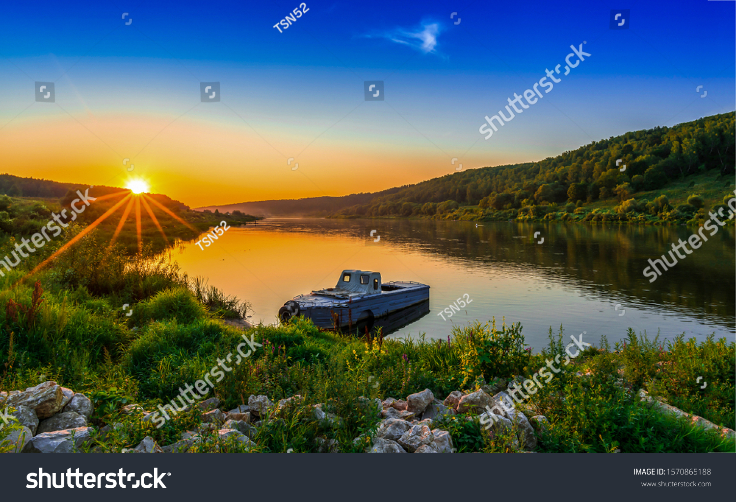 River boat at yellow sunset #1570865188