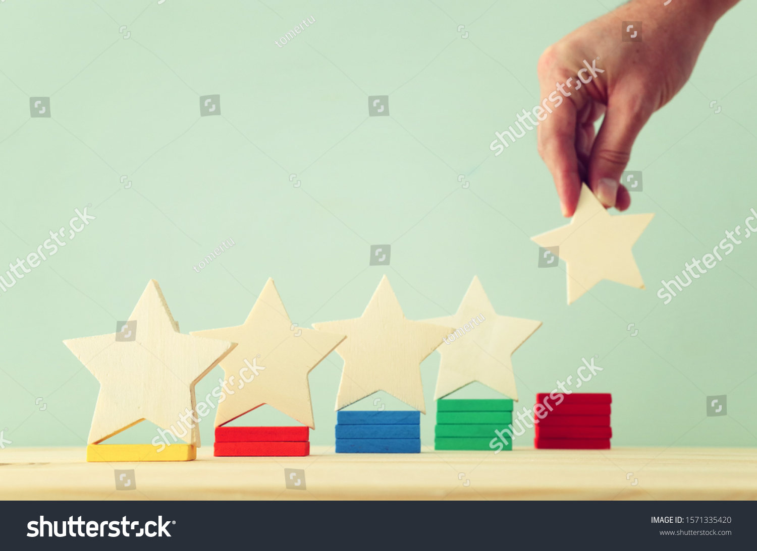 business concept image of setting a five star goal. increase rating or ranking, evaluation and classification idea #1571335420