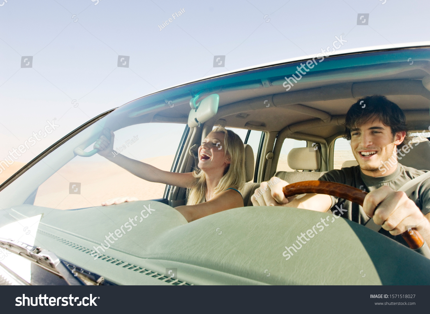 A young couple in a car #1571518027