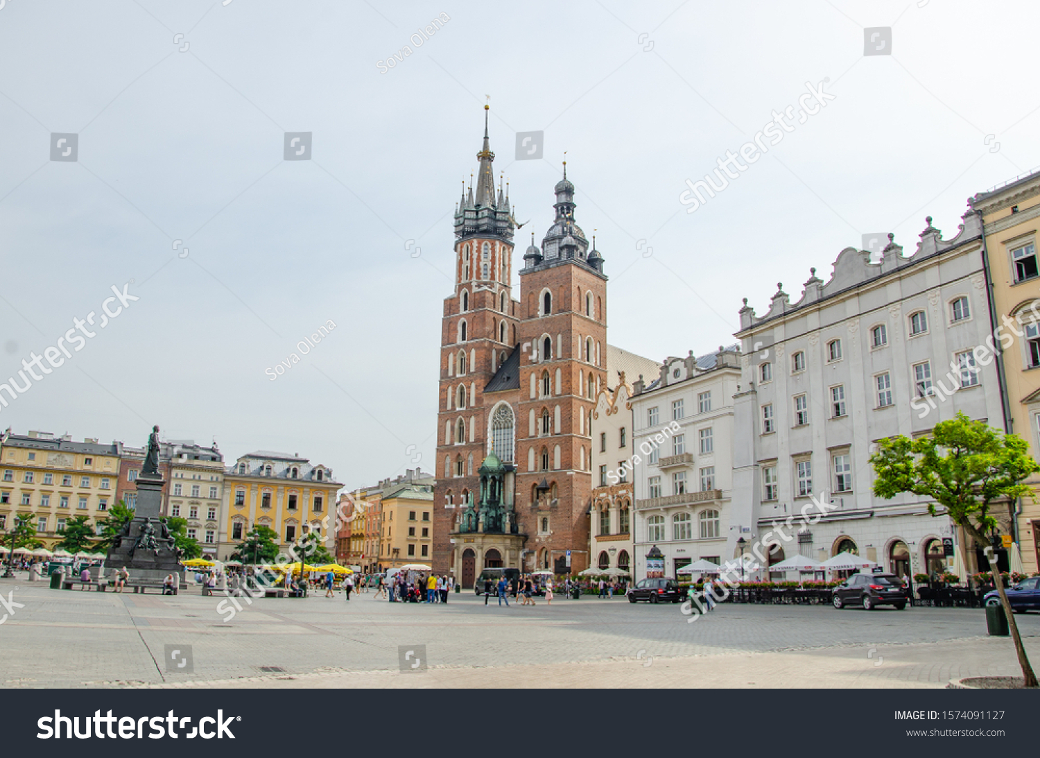 Krakow/ Poland- August 7 2019: Maria basilica and market square. #1574091127