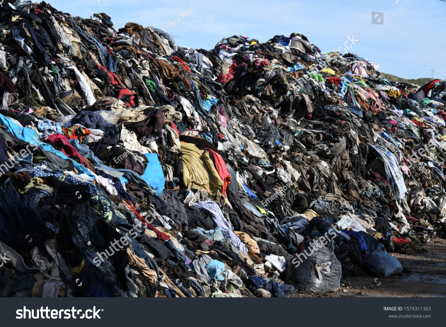 Burnt clothes on a bin in the province of Alicante, Costa Blanca, Spain #1574311363