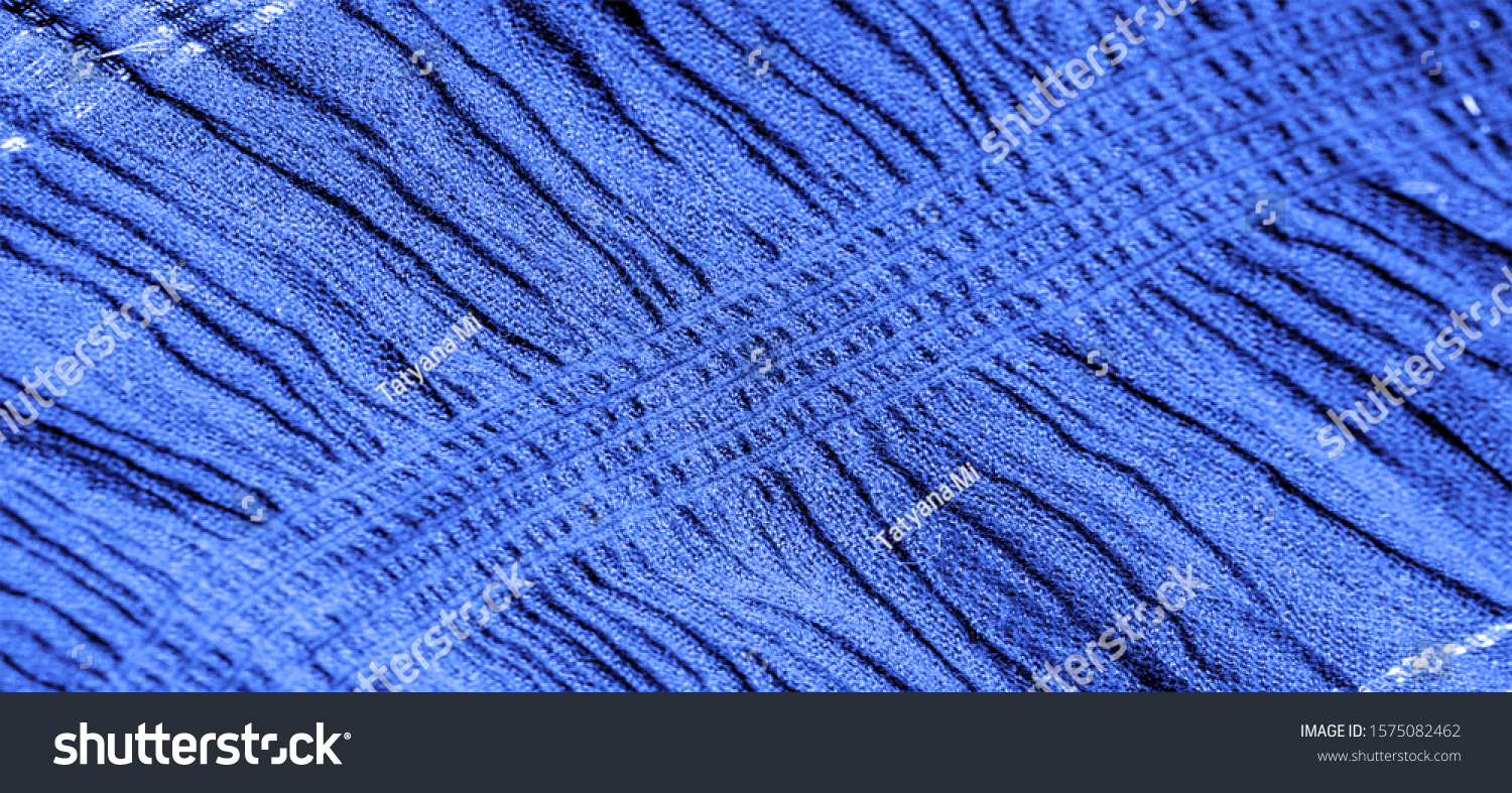 The texture of the background picture, the ornament of the decor, sapphire blue corrugated fabric, fabric with parallel or diagonal folds with serrated folds; products from such a fabric. #1575082462
