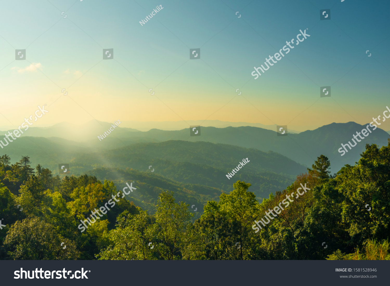 Beautiful view on the top of the mountain sunshining and clear sky  #1581528946