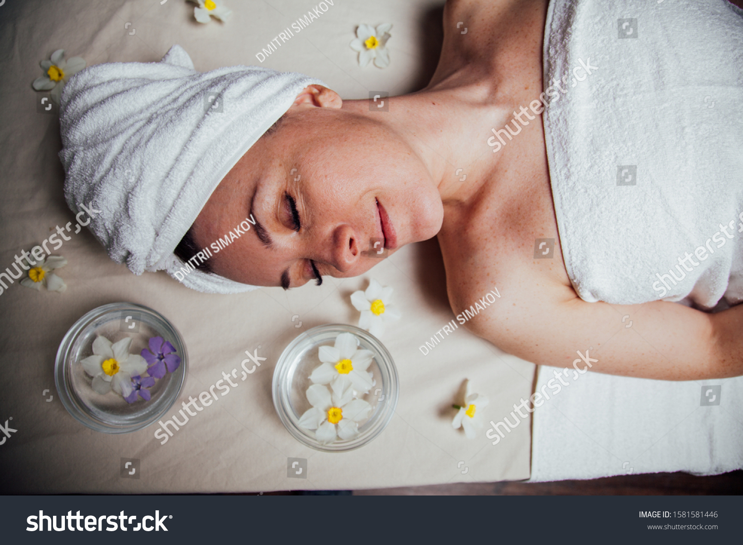 the beautiful girl lying in Spa massage sauna #1581581446