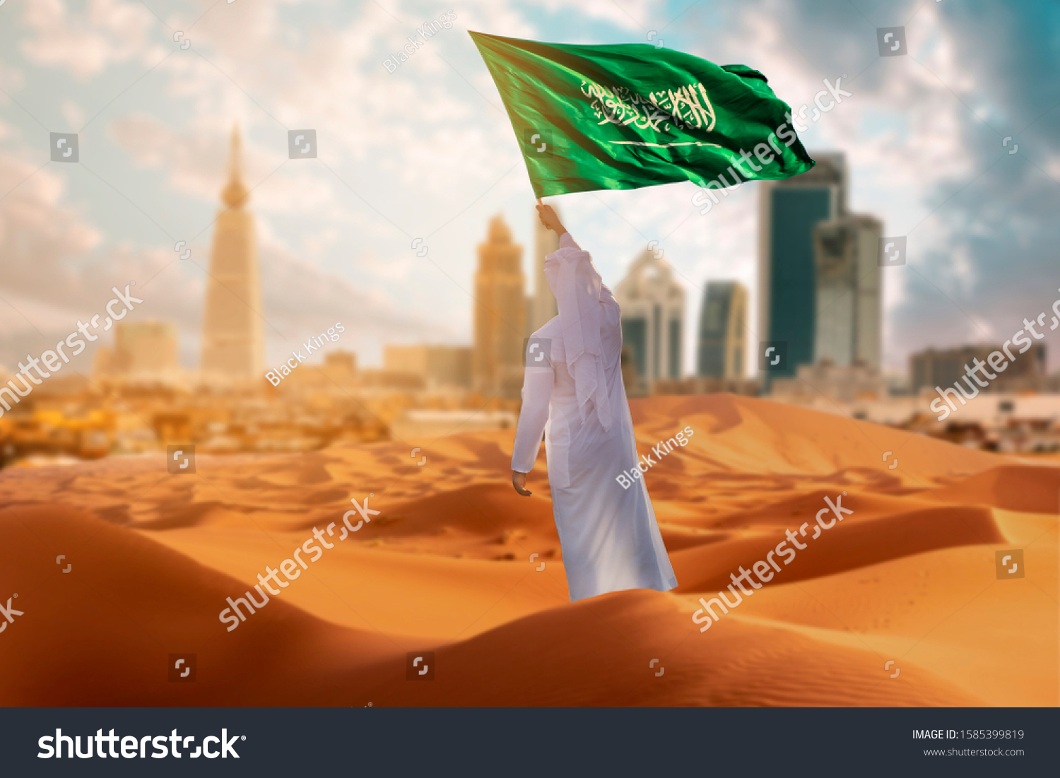 Saudi young Arab man holding Saudi Arabia  flag, celebrating the national day #1585399819