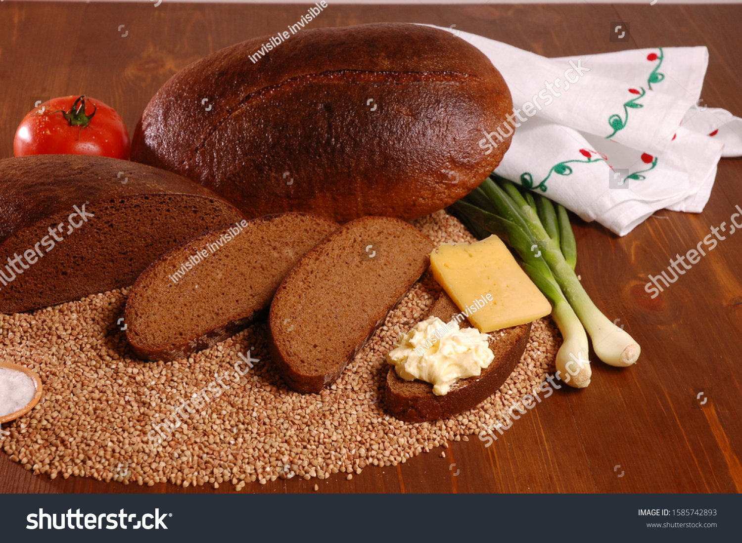 Rye bread. Rye bread with ingredients on a wooden table. #1585742893