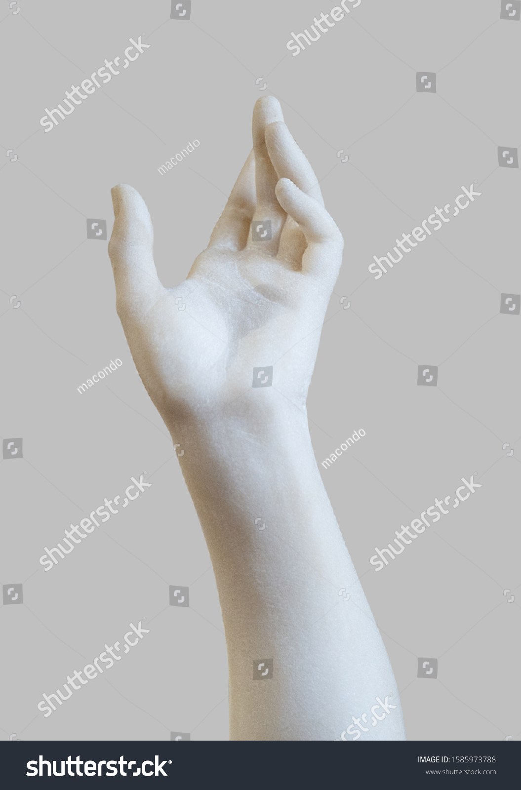 side view closeup of white stone marble statue hand reaching out to the heavens isolated on grey background #1585973788