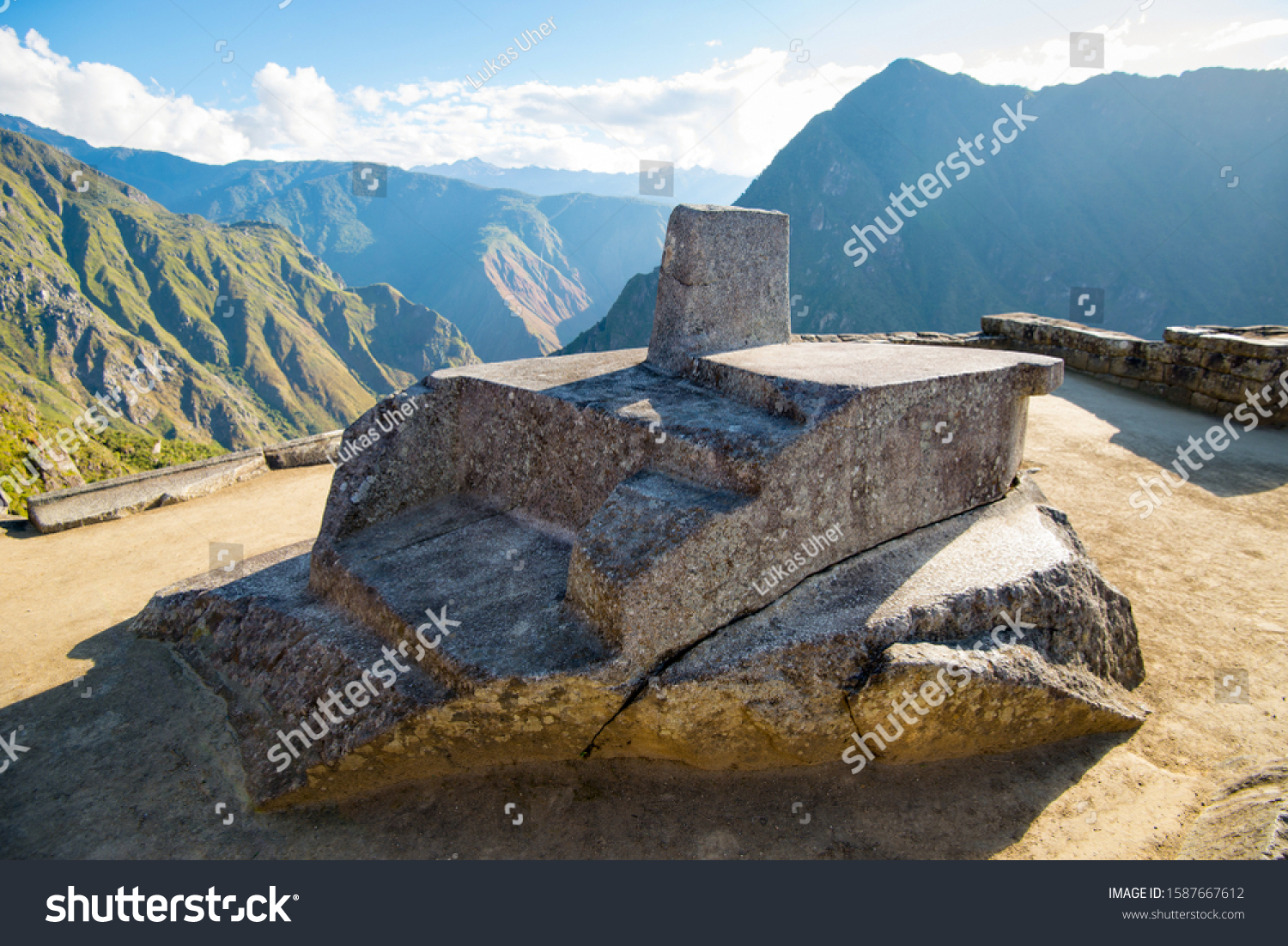 Intihuatana, sacred sun dial in Inca ruins Machu Picchu, Peru, South America #1587667612