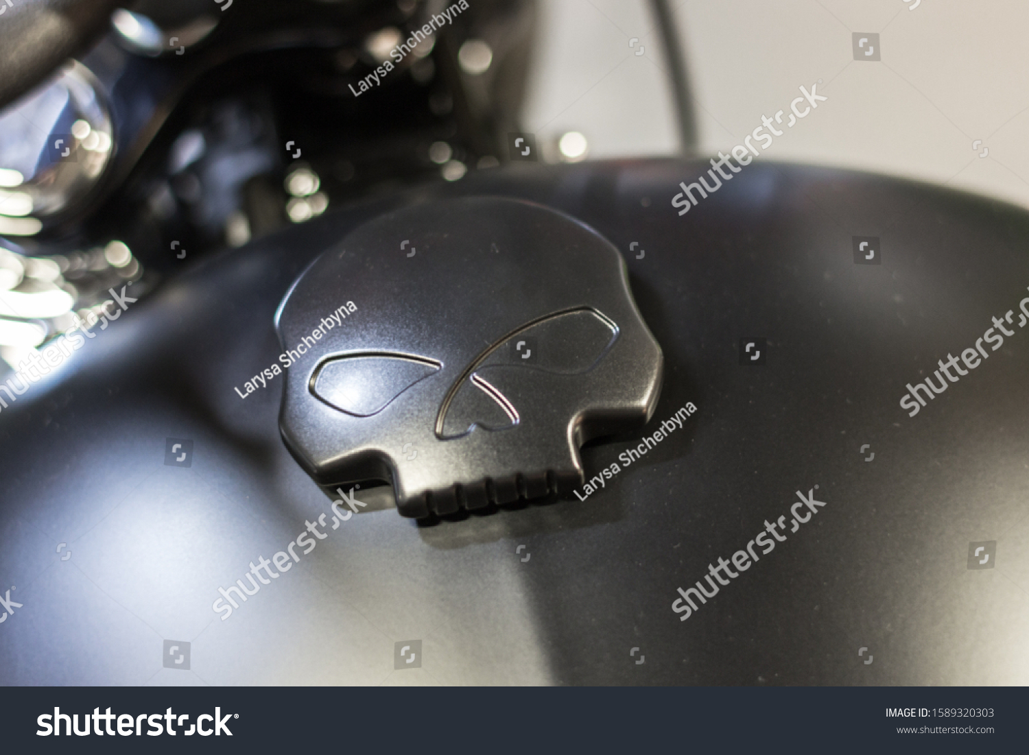 Biker symbols.aaa. Gothick style. Motorcycle decoration. The mascot of bikers. A way to pay off death. Tribute to death. Halloween symbol. The face of the skeleton. #1589320303