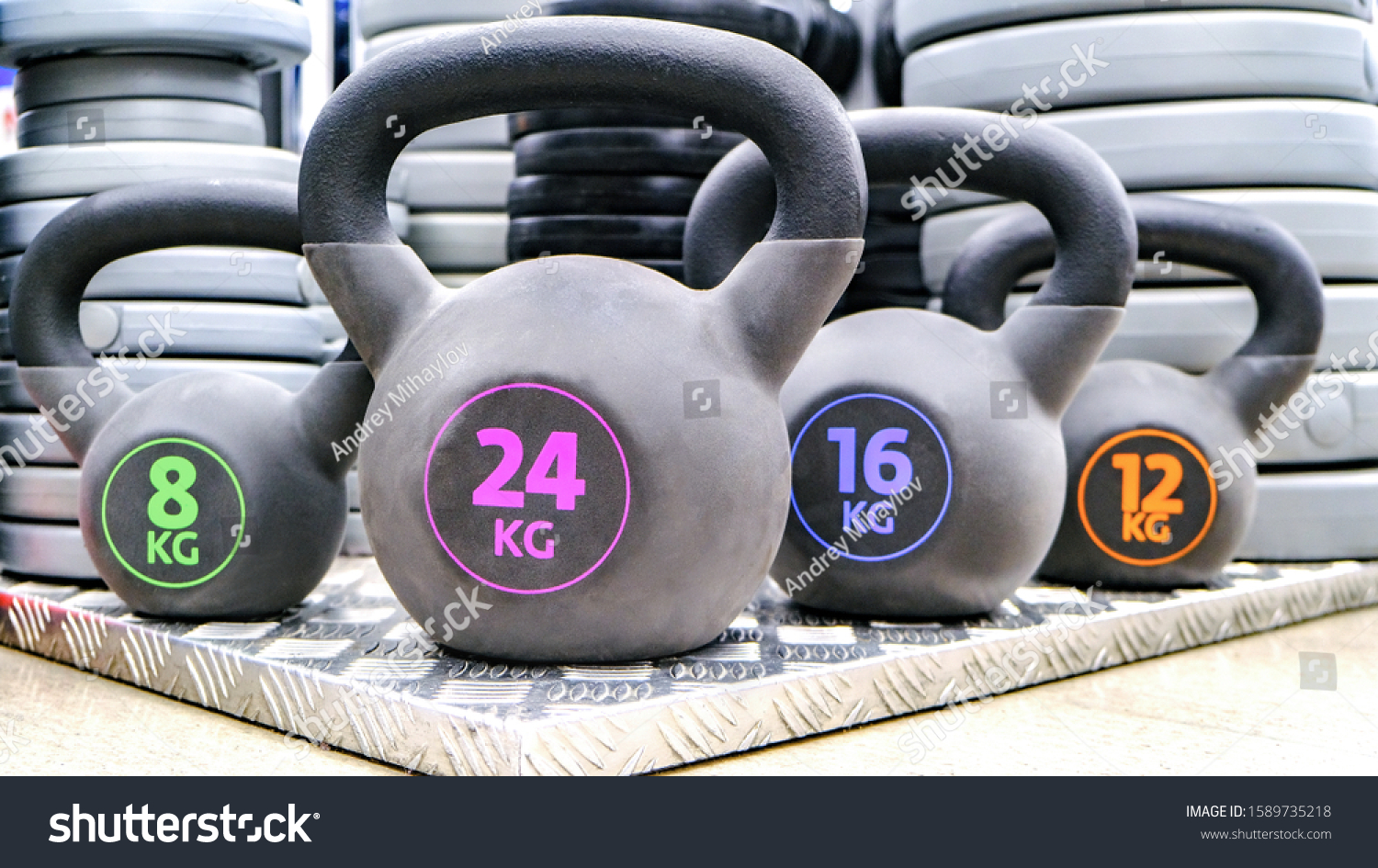 Weights and dumbbells. Fit workout, workout body Workout for young athlete. Training in the gym. #1589735218