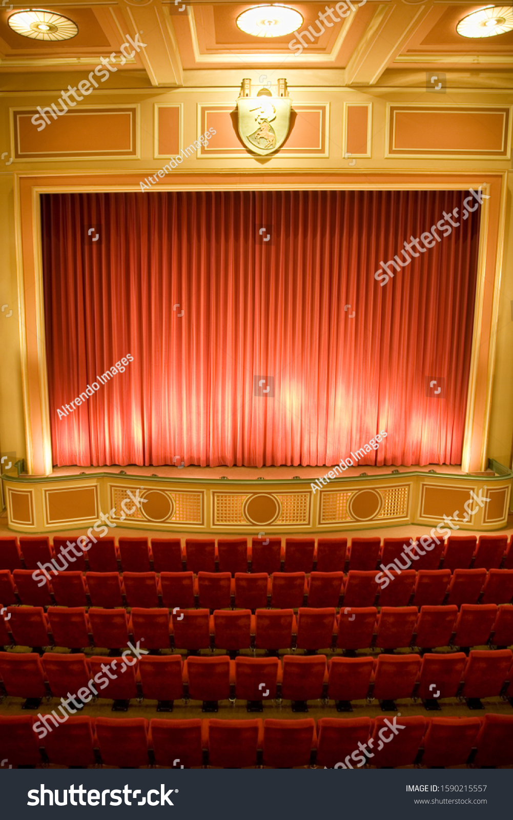 Seating and stage in empty theater #1590215557