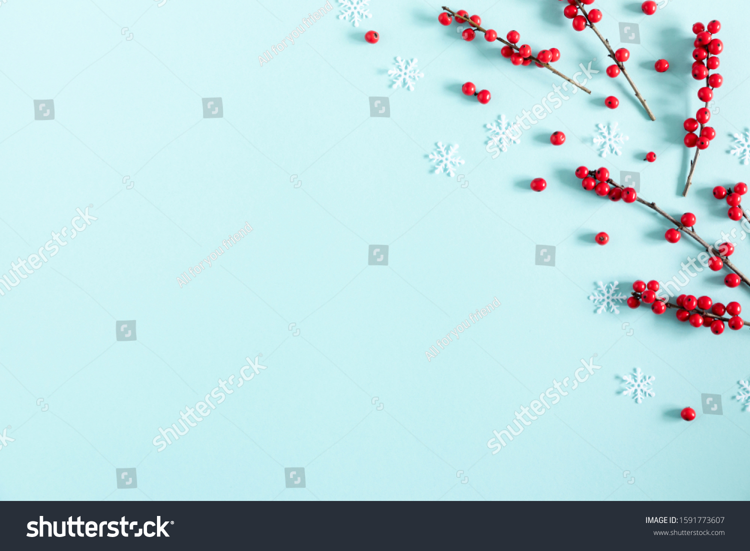 Christmas modern composition. Red berries on pastel blue background. Christmas, New Year, winter concept. Flat lay, top view, copy space #1591773607