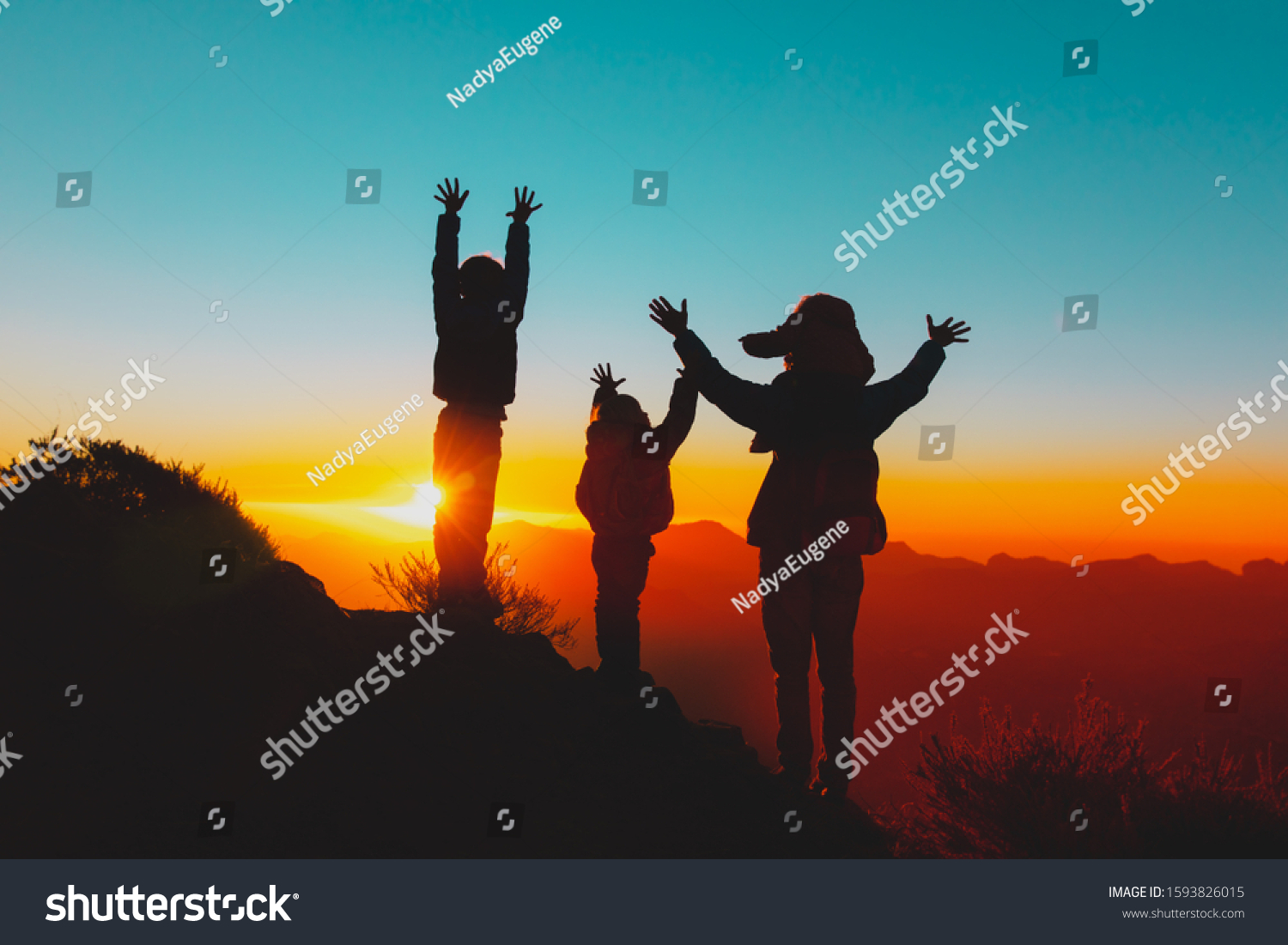 happy father with kids travel in sunset mountains, family hiking in nature #1593826015