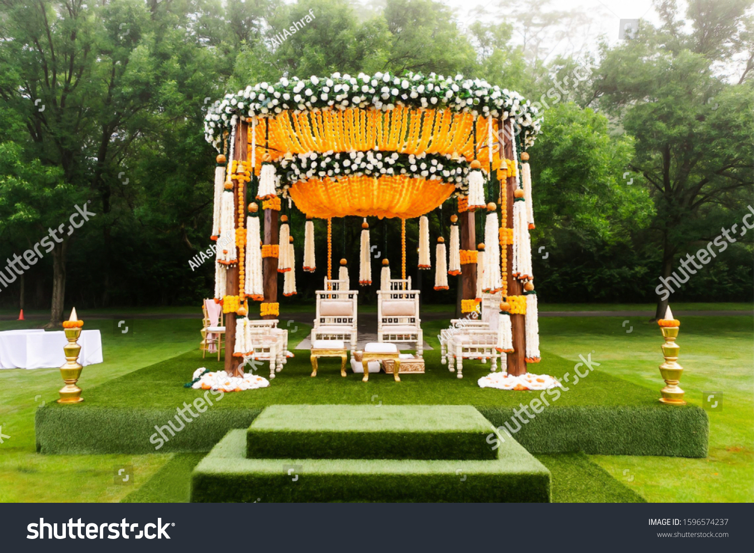 Indian wedding mandap decor yellow and white flowers #1596574237