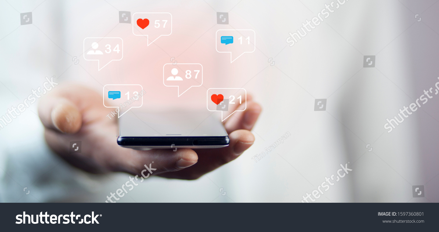 Concept of using a smartphone for social media #1597360801