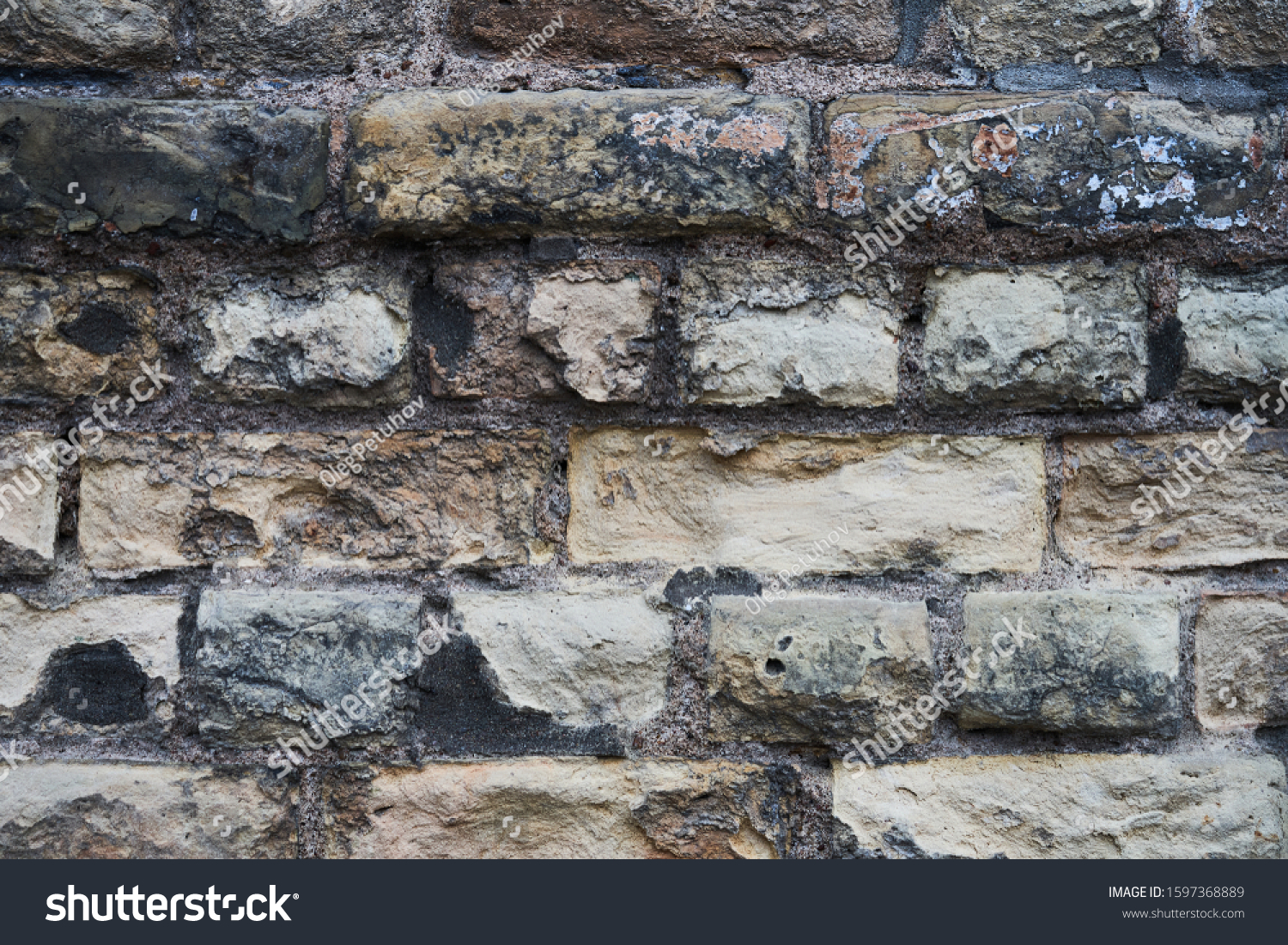 horizontal part of black painted brick wall #1597368889