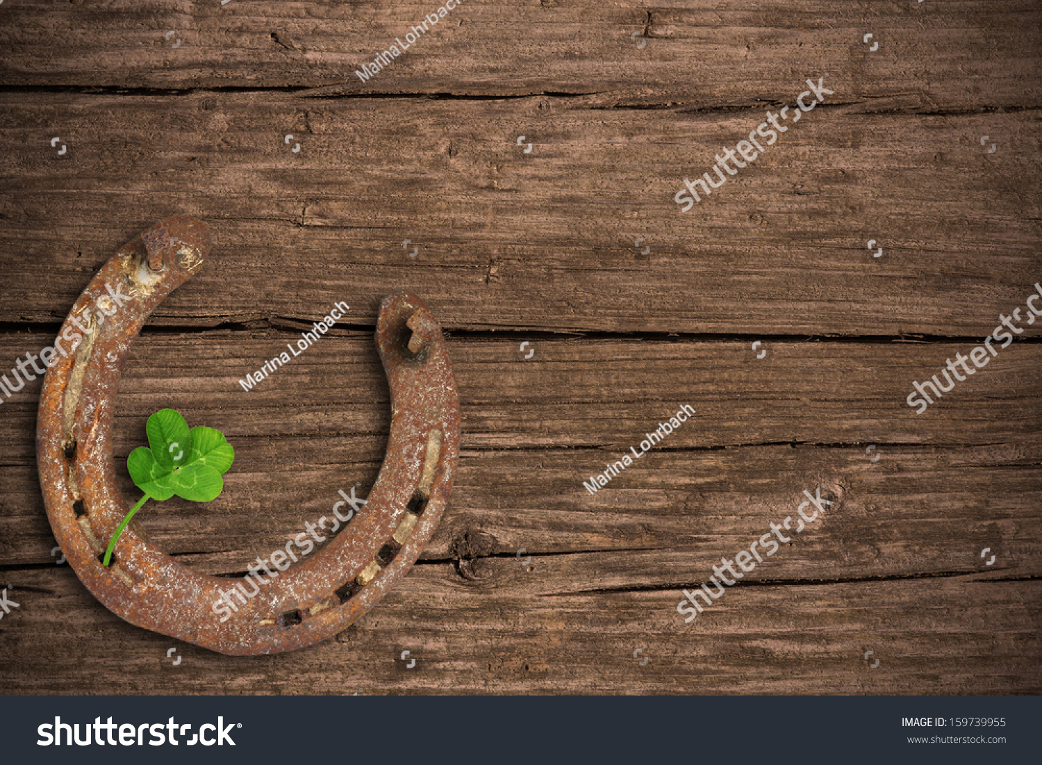 Blackboard with four-leaved clover and a horse shoe #159739955