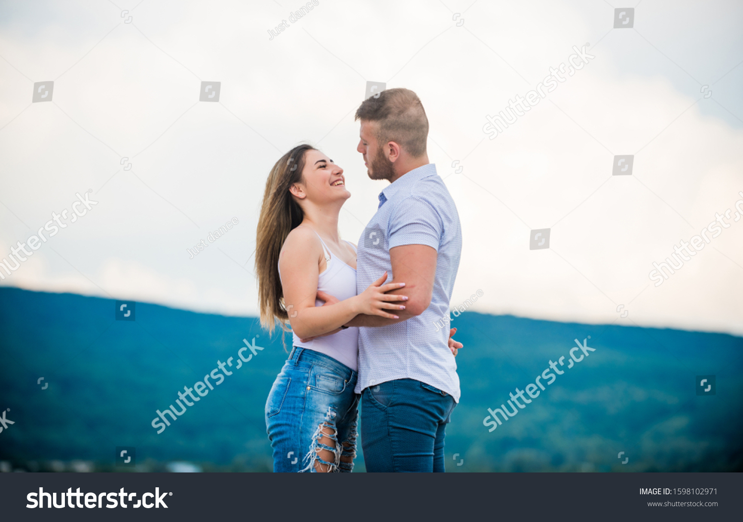 Supporting her. Cute relationship. Man and woman cuddle nature background. Together forever. Love story. Just married. Honeymoon concept. Romantic relations. True love. Family love. Couple in love. #1598102971