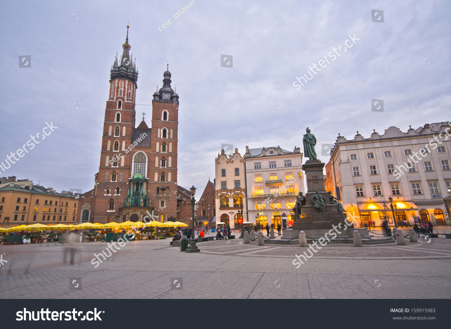 KRAKOW, POLAND - MARCH 10: St. Mary's Church in historical center of Krakow, March 10, 2012 in Krakow, Poland. This year the city was visited by 8.1 million tourists, which is the highest level. #159915983