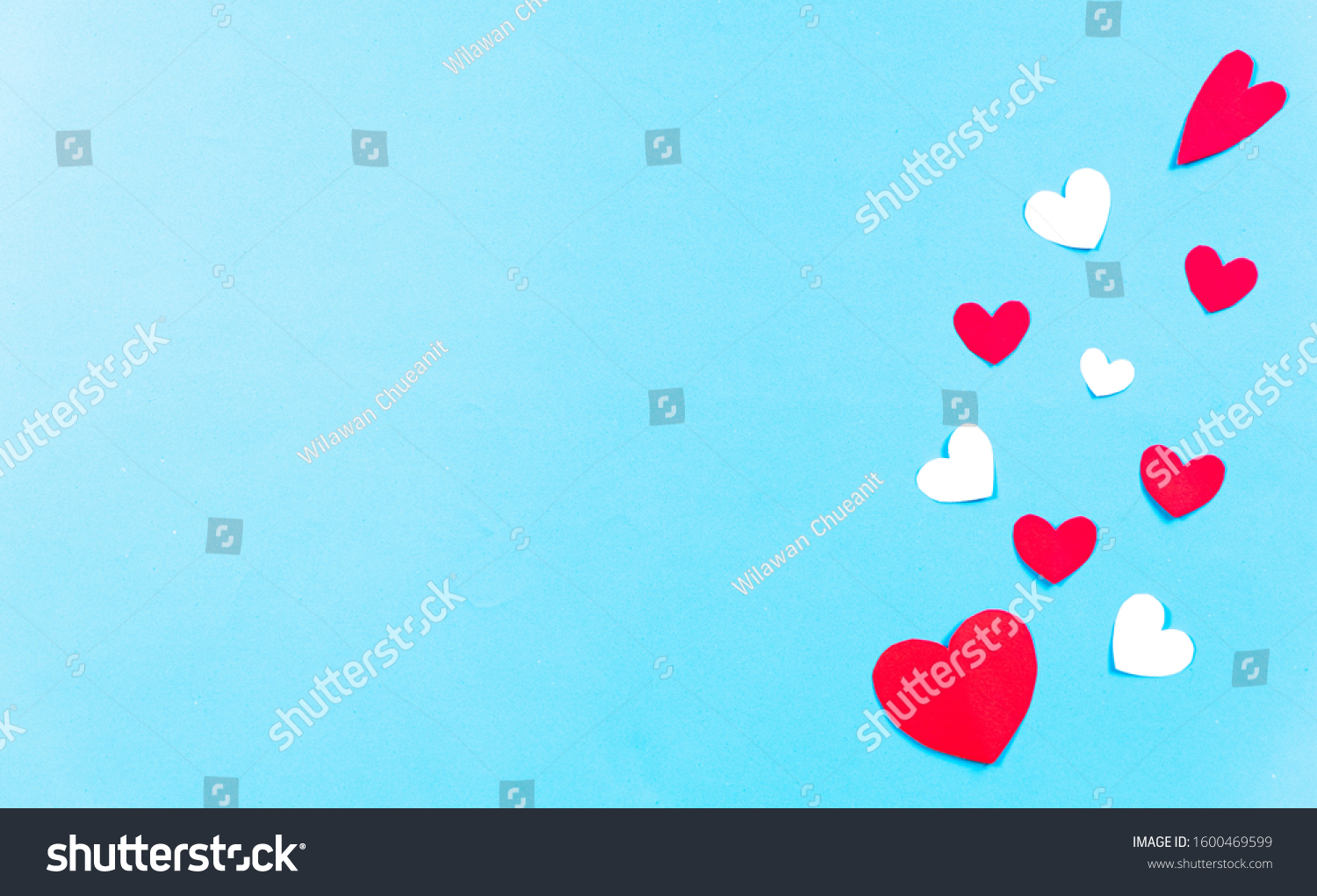 Valentines Day background. White and red hearts on pastel blue background. Valentines day concept. Top view,  copy space. #1600469599