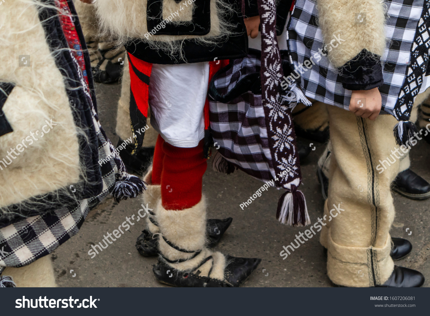 Sighetu Marmatiei, Romania: Maramures traditional costumes. Traditional Romanian peasant sandals which is worn with the Romanian peasant costume at Winter Customs and Traditions Marmatia Festival #1607206081