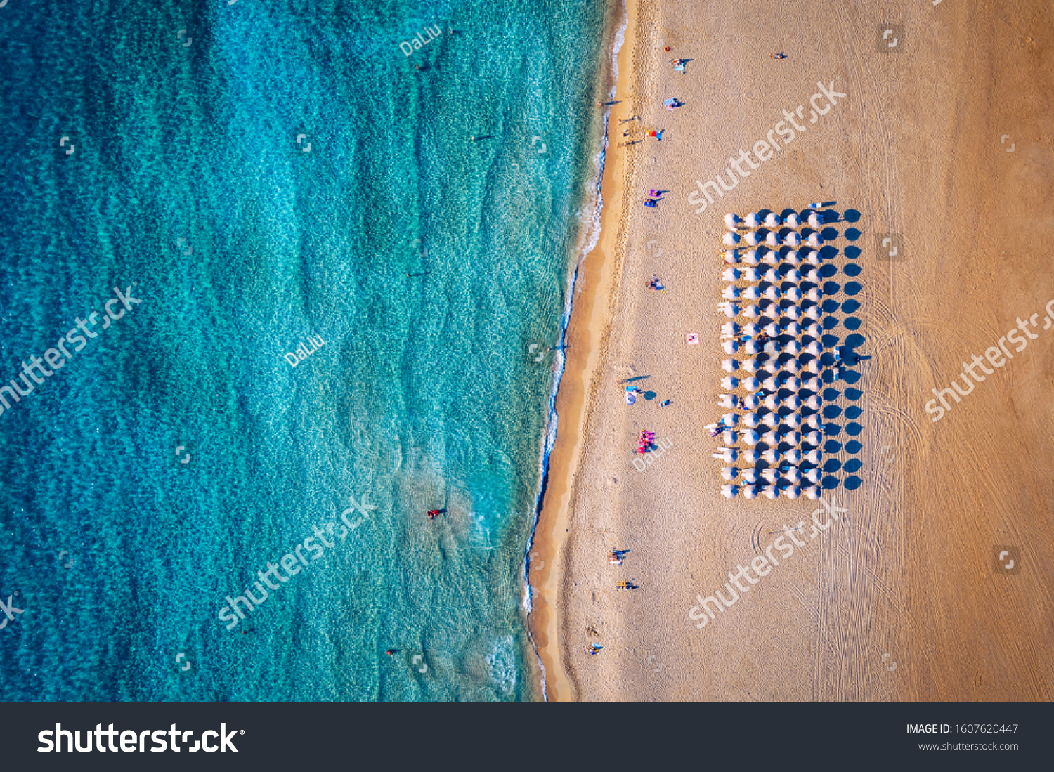 Aerial shot of beautiful turquoise beach Falasarna (Falassarna) in Crete, Greece. View of famous paradise sandy deep turquoise beach of Falasarna (Falassarna) in North West, Crete island, Greece. #1607620447