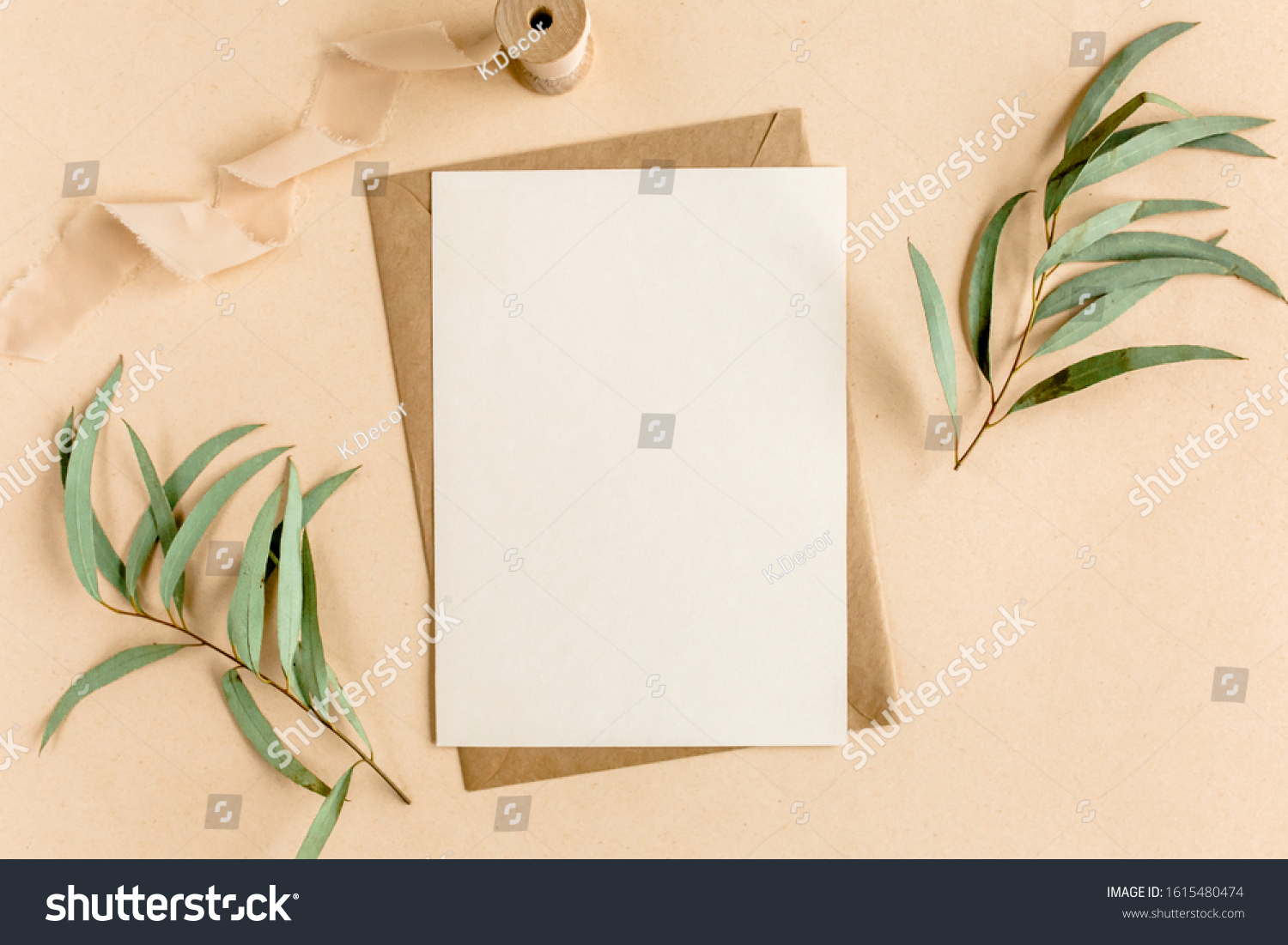 Mockup invitation, blank greeting card and green leaves eucalyptus. Flat lay, top view. #1615480474