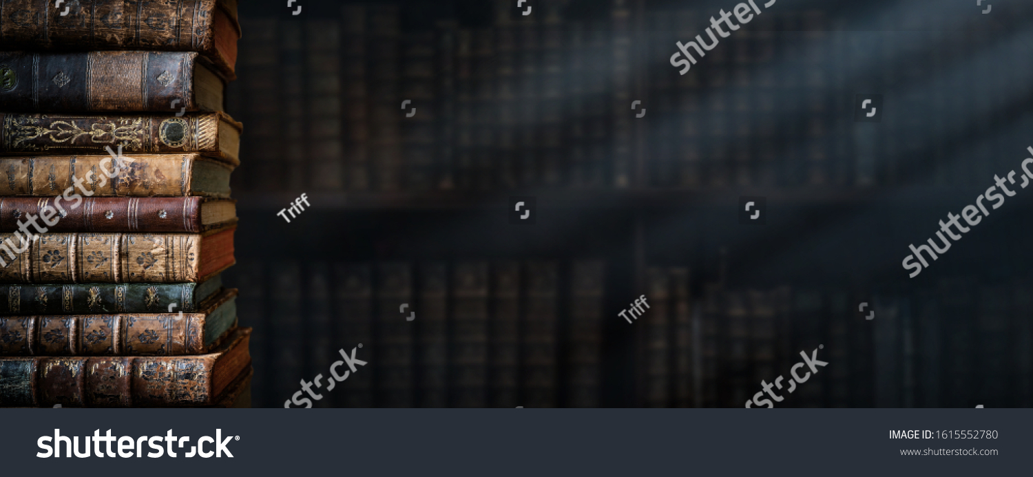 Old books on wooden shelf and ray of light. Bookshelf history theme grunge background. Concept on the theme of history, nostalgia, old age. Retro style. #1615552780