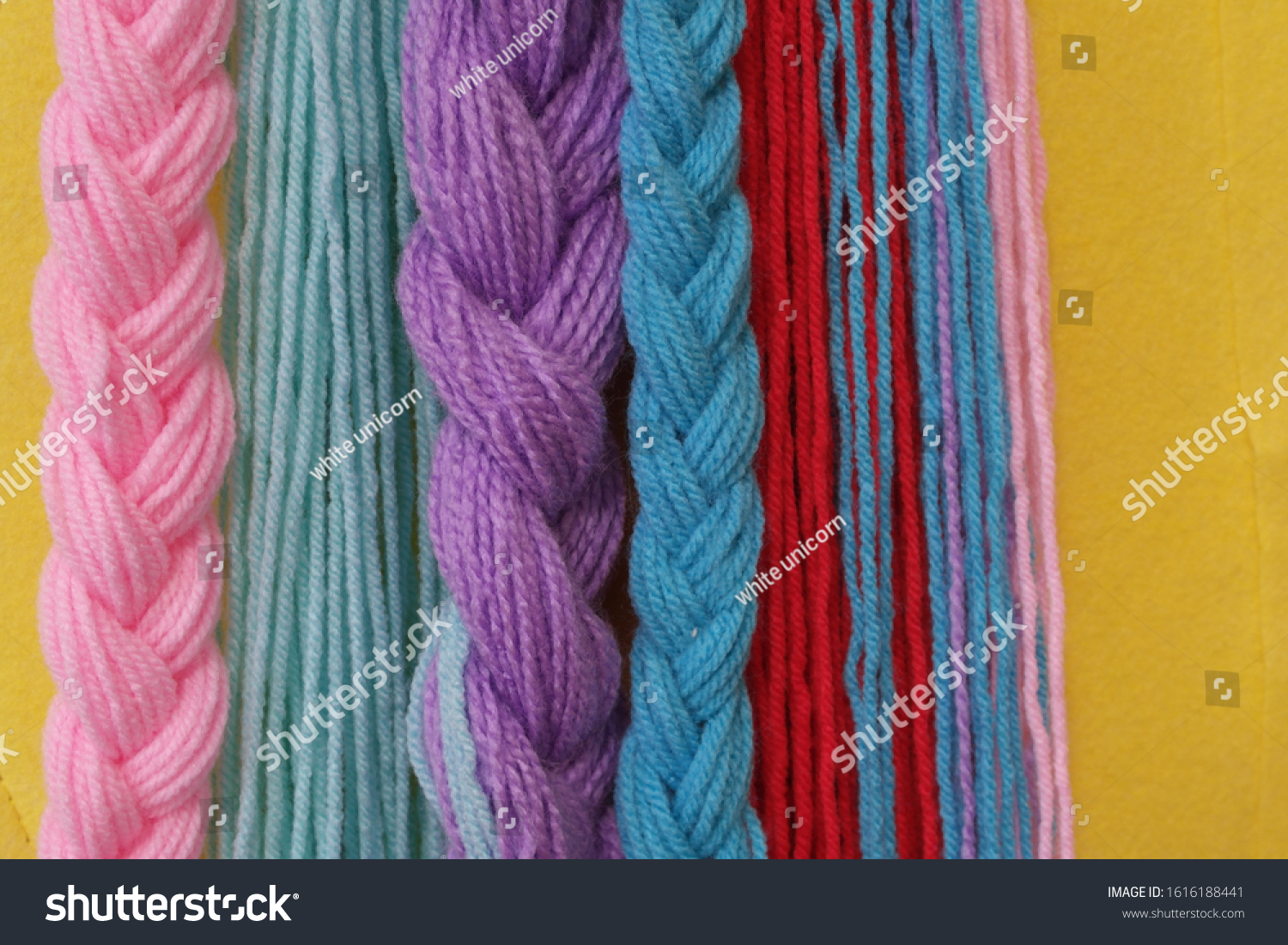 multi-colored yarn with threads and braided. Vibrant colors #1616188441