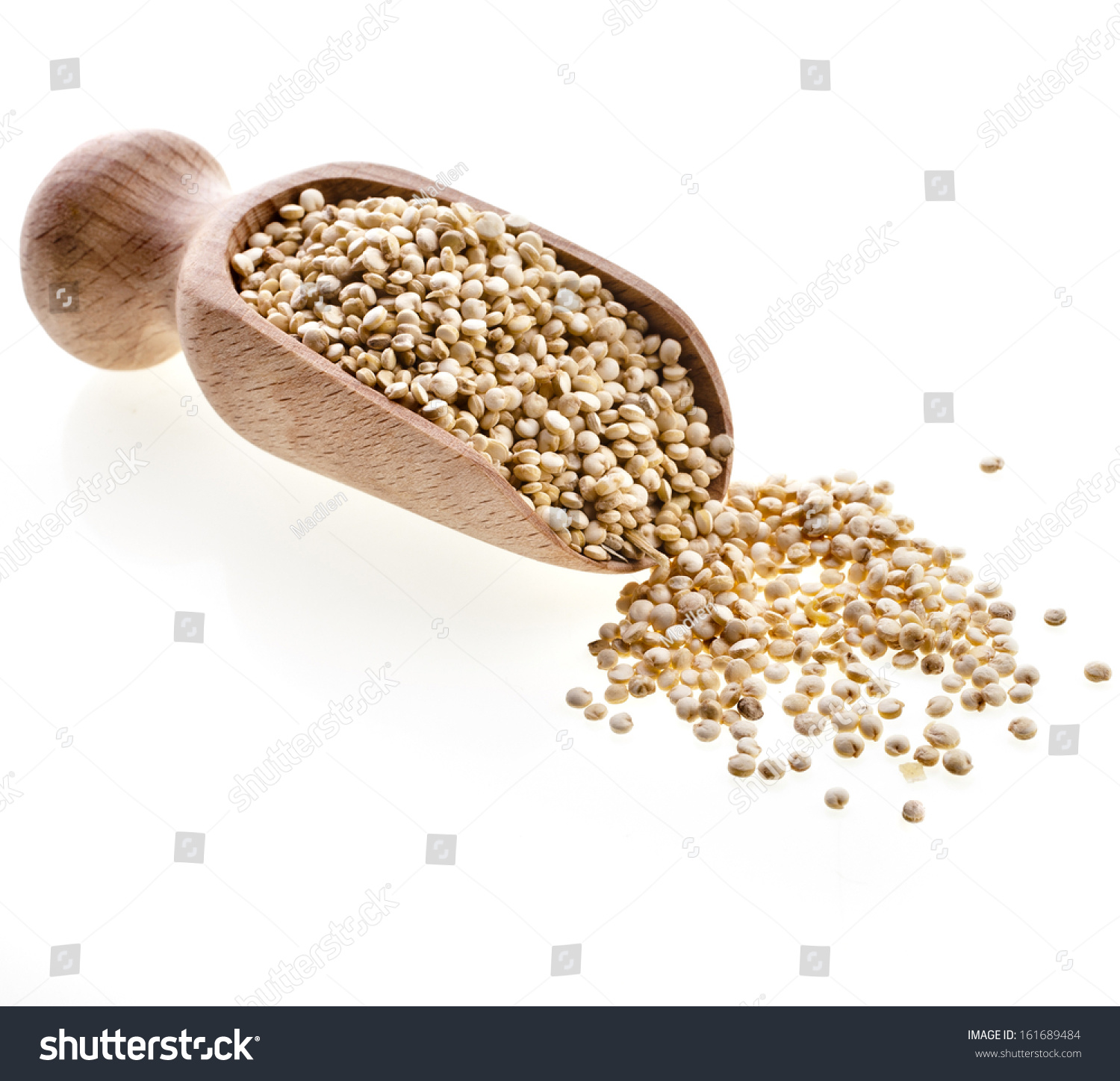 quinoa seed grain  in a wooden bowl scoop close up isolated on a white background #161689484