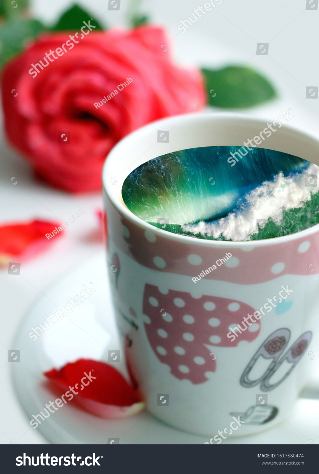 White cup with water. Sea. Ocean. Sea waves. Creative postcard. #1617580474