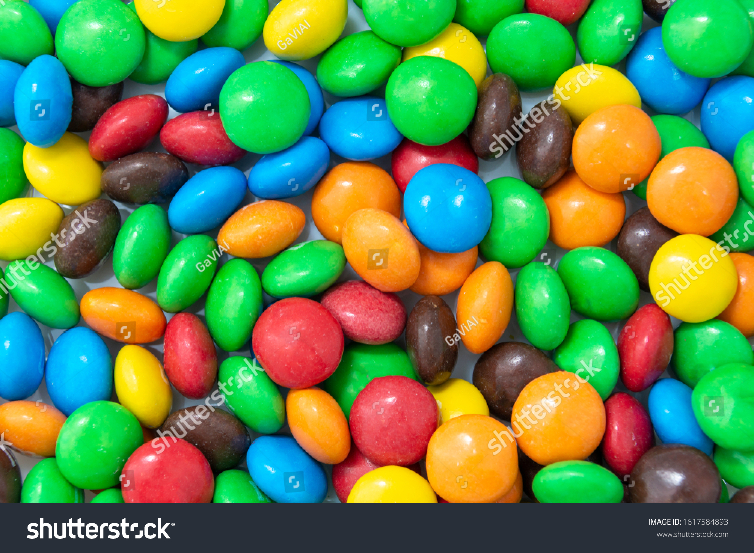 Multi-colored sweet candies (confectionery) of different colors. Colorful abstract background. #1617584893