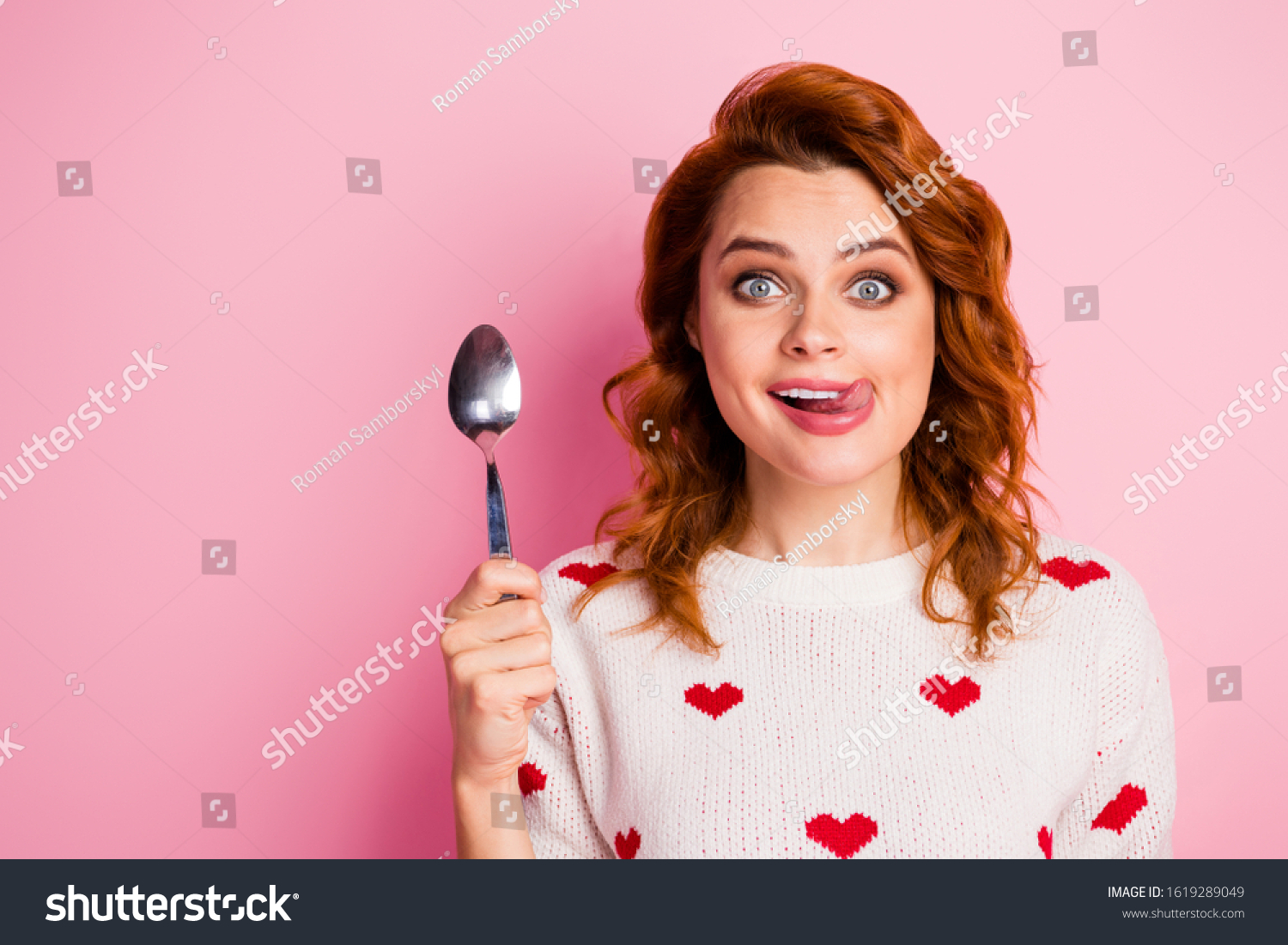 Close-up portrait of her she nice attractive lovely funky comic cheerful cheery wavy-haired girl licking lip want wish tasty yummy delicious festal meal isolated on pink pastel color background #1619289049