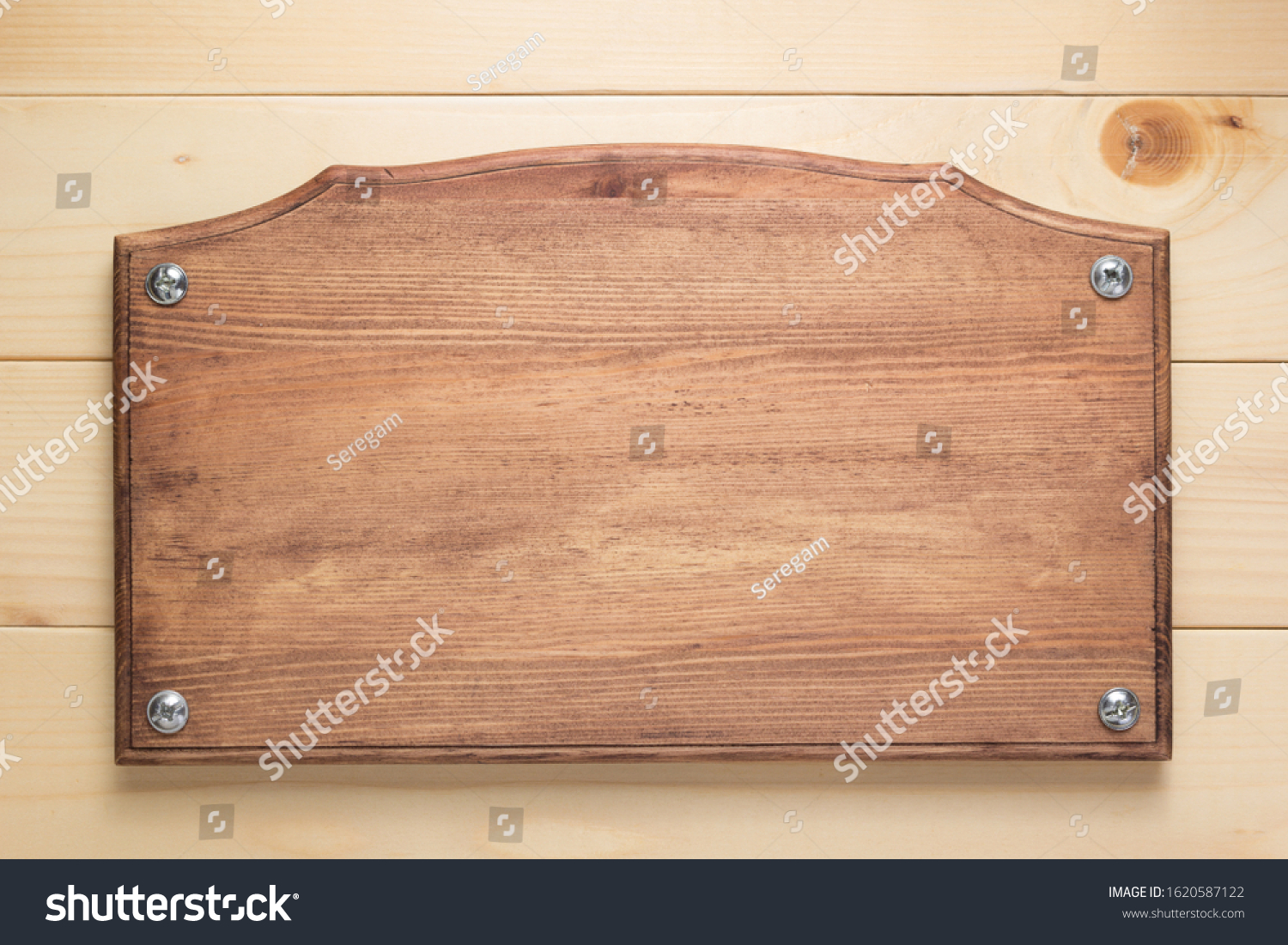 nameplate or wall sign at  wooden background texture surface, with screws #1620587122