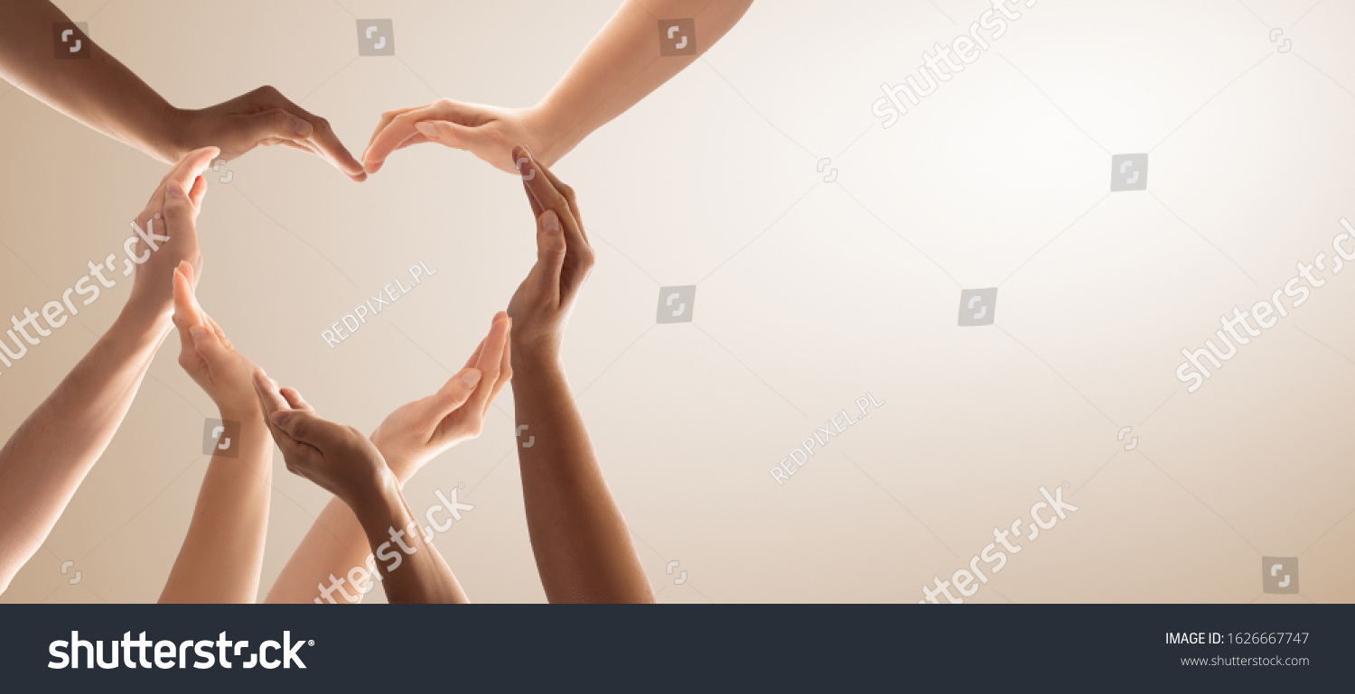 Symbol and shape of heart created from hands.The concept of unity, cooperation, partnership, teamwork and charity. #1626667747
