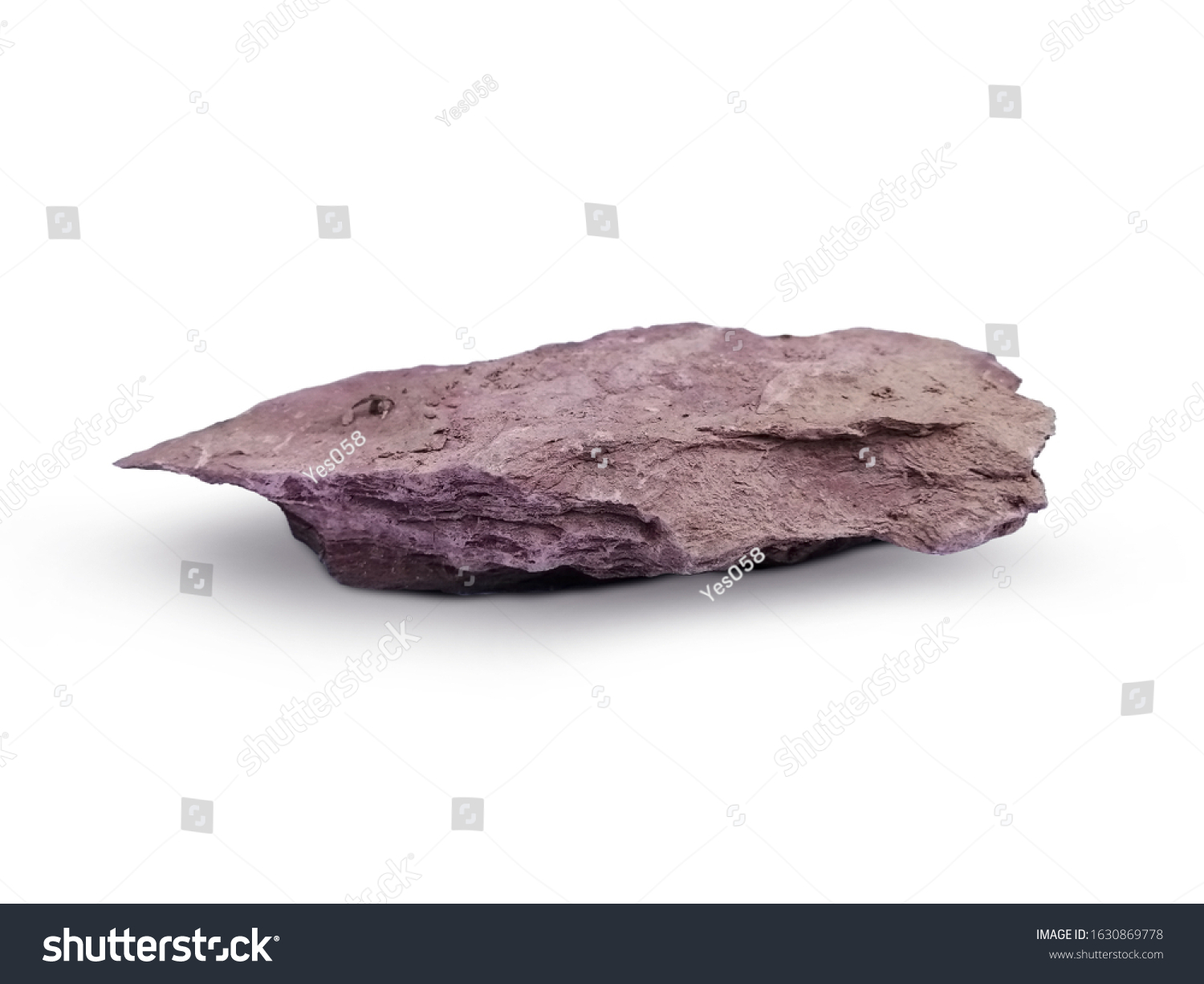 Shale​ stone​ ​isolated​ on​ ​white​ ​background.​​Shale is a very fine grained sedimentary rock. There are mud elements that contain mineral ores with mineral debris. Especially Quartz and Calcite. #1630869778