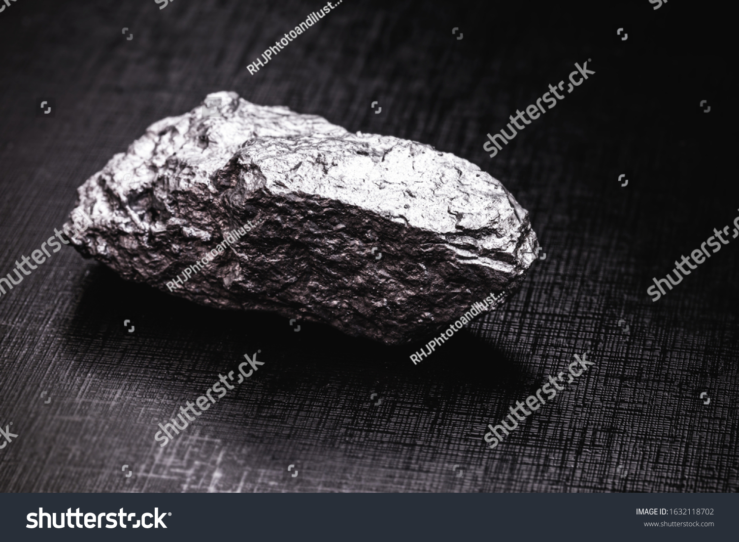 Palladium is a chemical element that at room temperature contracts in the solid state. Metal used in industry. Mineral extraction concept. #1632118702