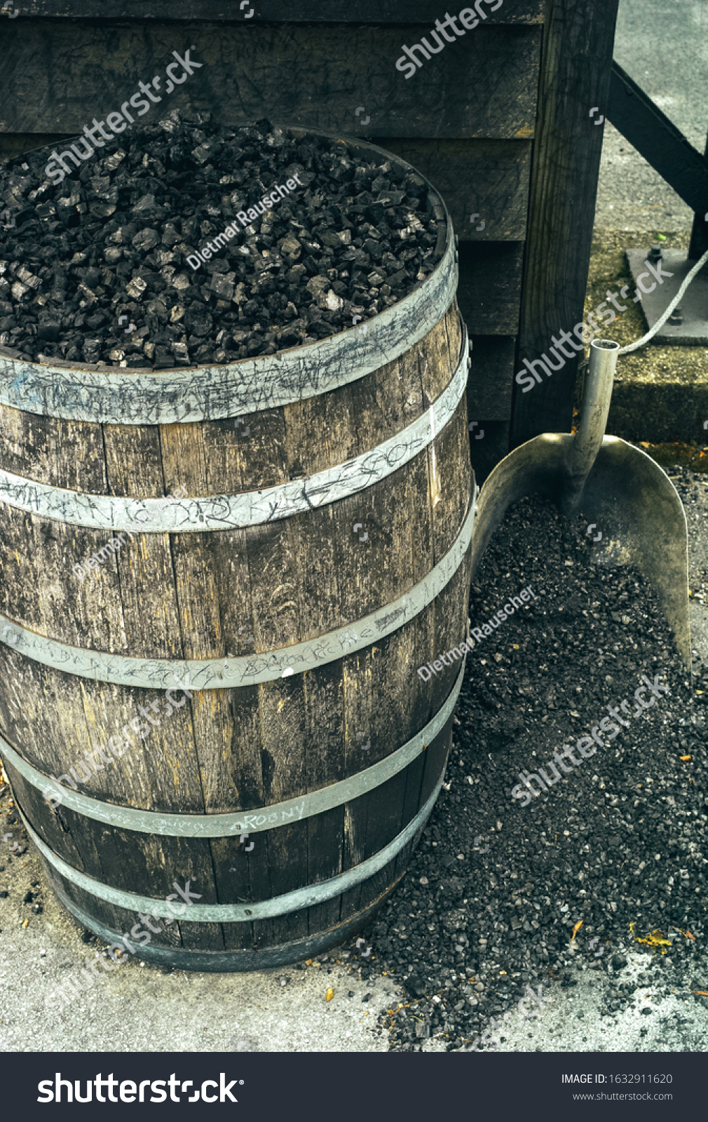 Charcoal in a Barrel and a Shovel, used for Mellowing Tennessee Whiskey by Filtration #1632911620